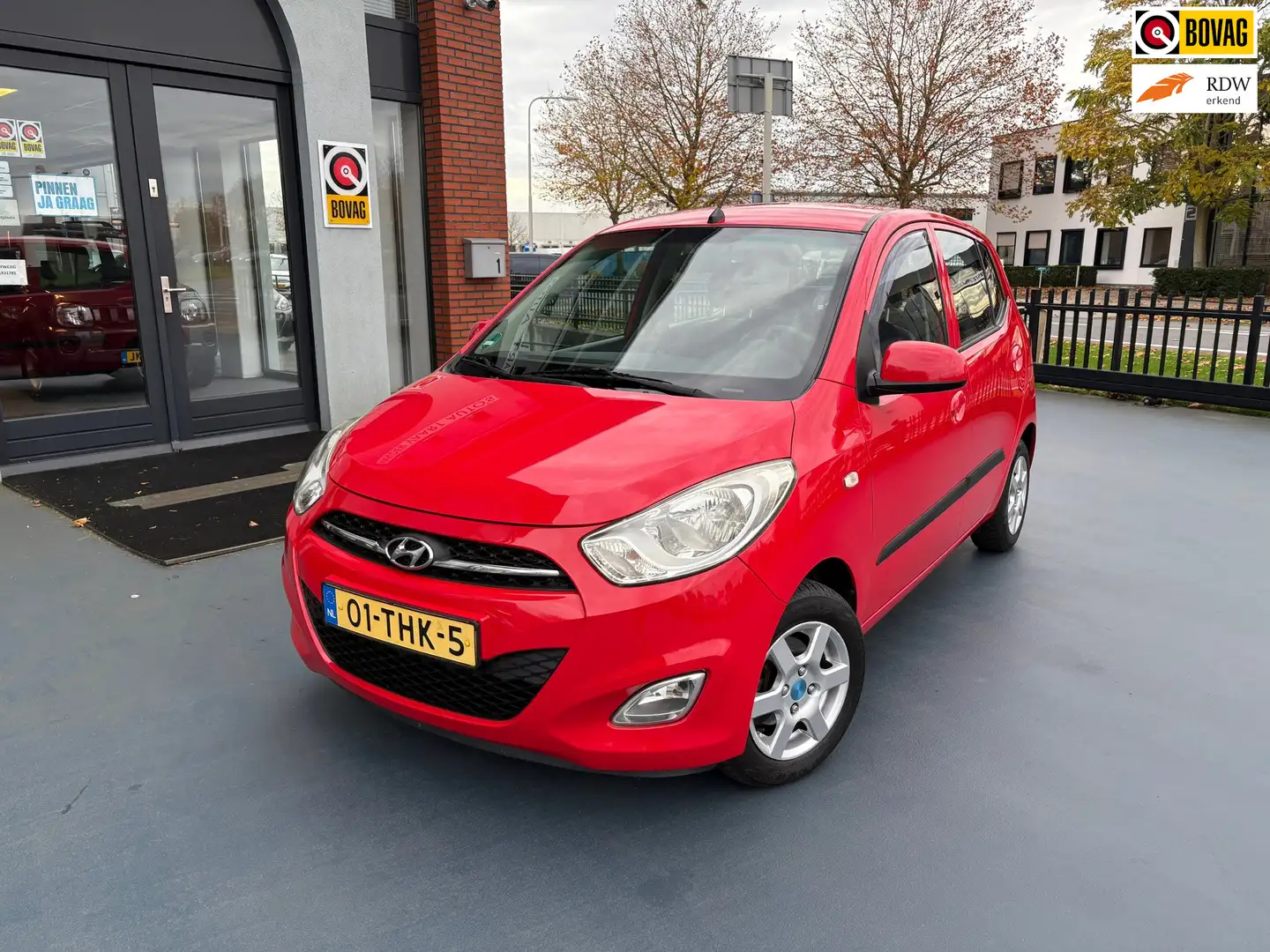 Hyundai i10 1.2 Plus AIRCO RADIO CD/AUX/USB Rouge - 1