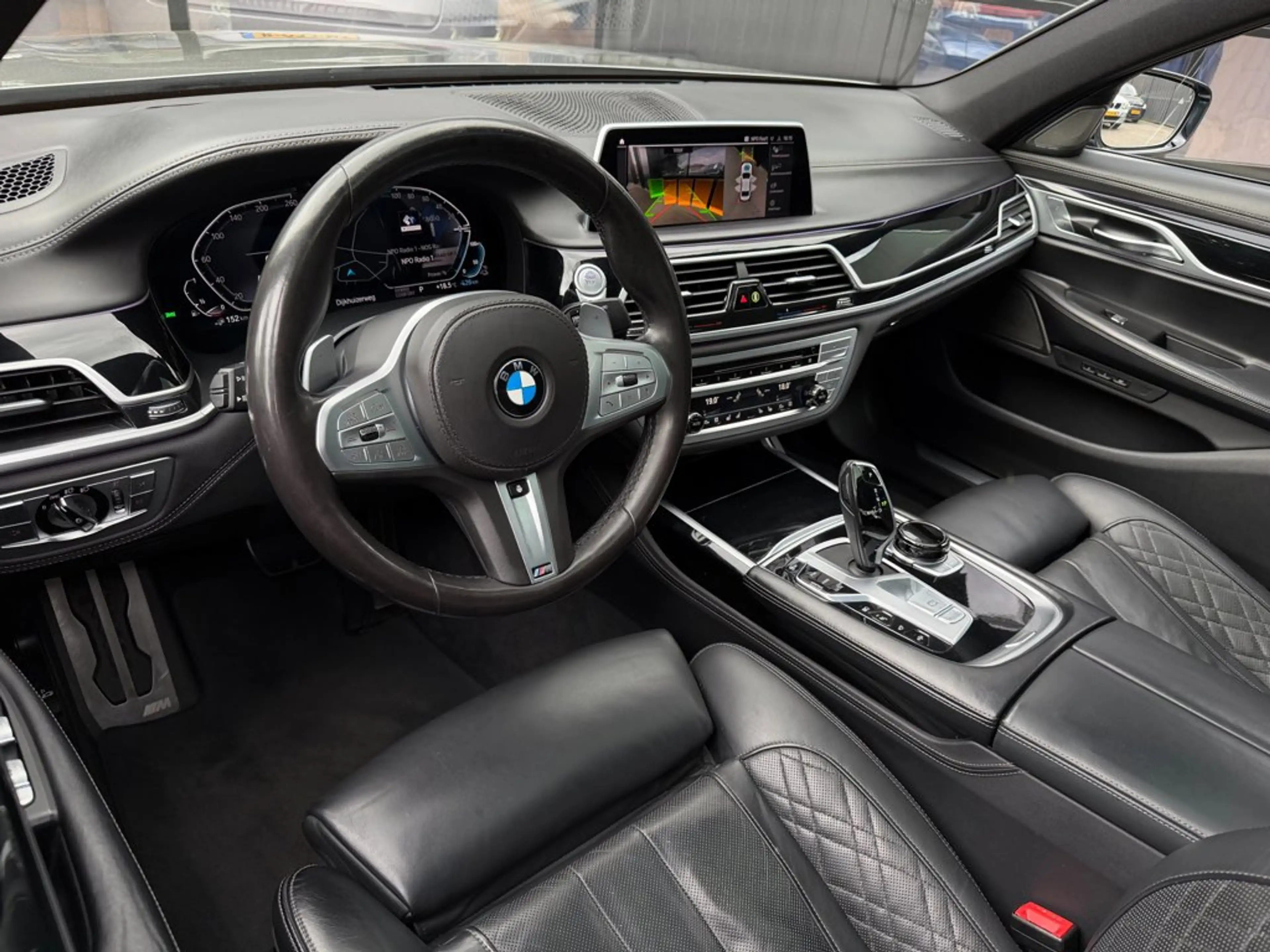 BMW 745 7-Serie 745e M-Sport Schuifdak Donington Grau — photo 10