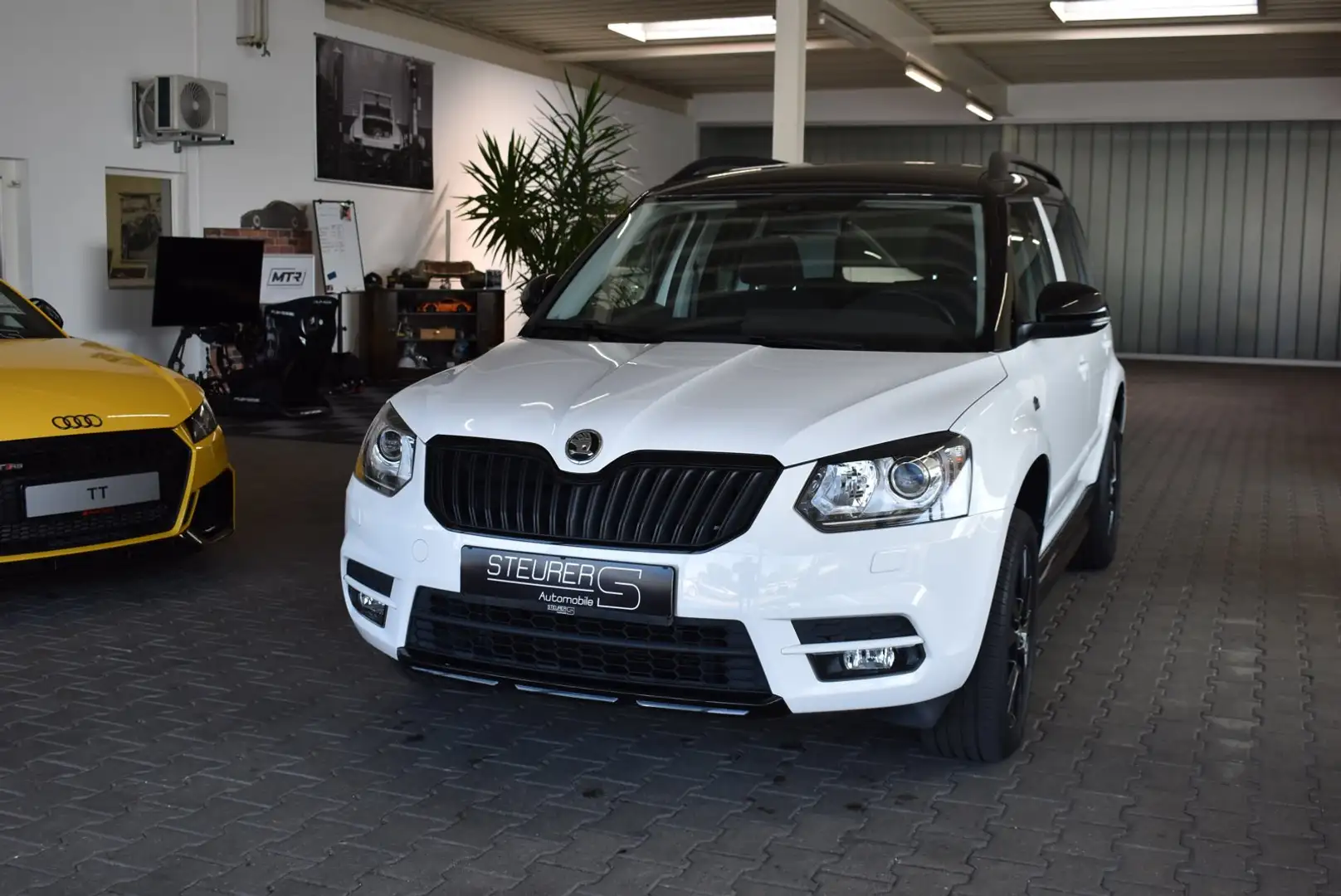 Skoda Yeti 1.2l TSI DSG Monte Carlo 1.Hand wenig KM Weiß - 1