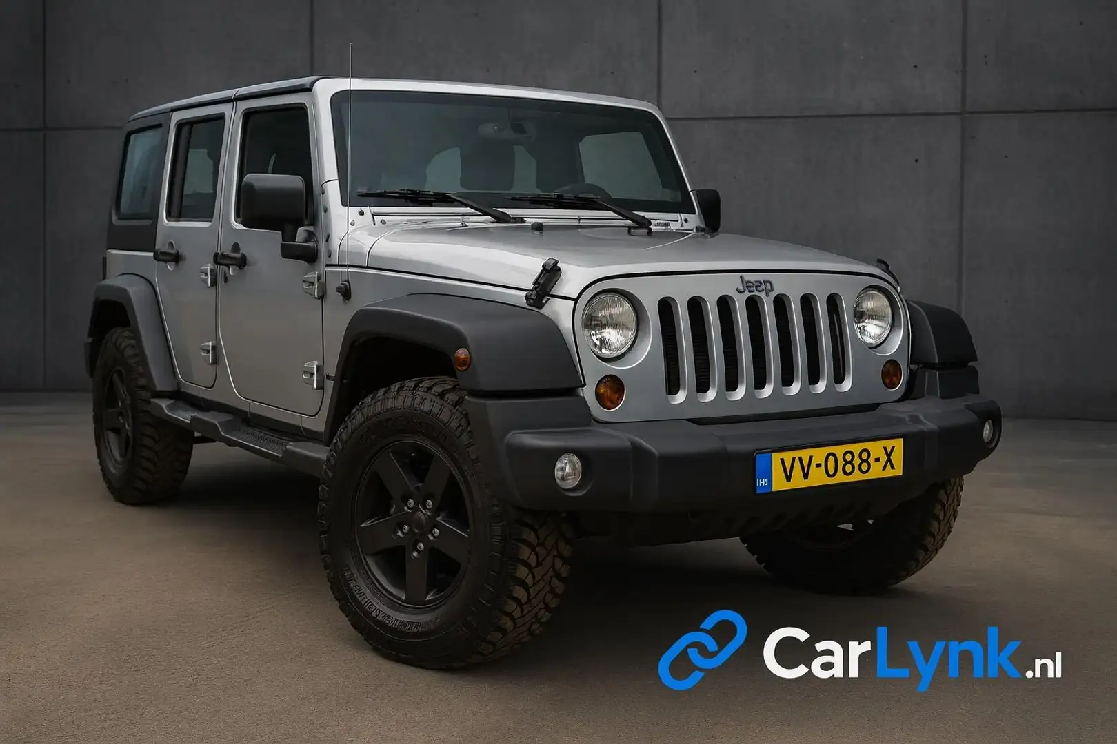 Jeep Wrangler 2.8 CRD Sport 4X4 32' Wielen (grijs kenteken) Zilver - 1