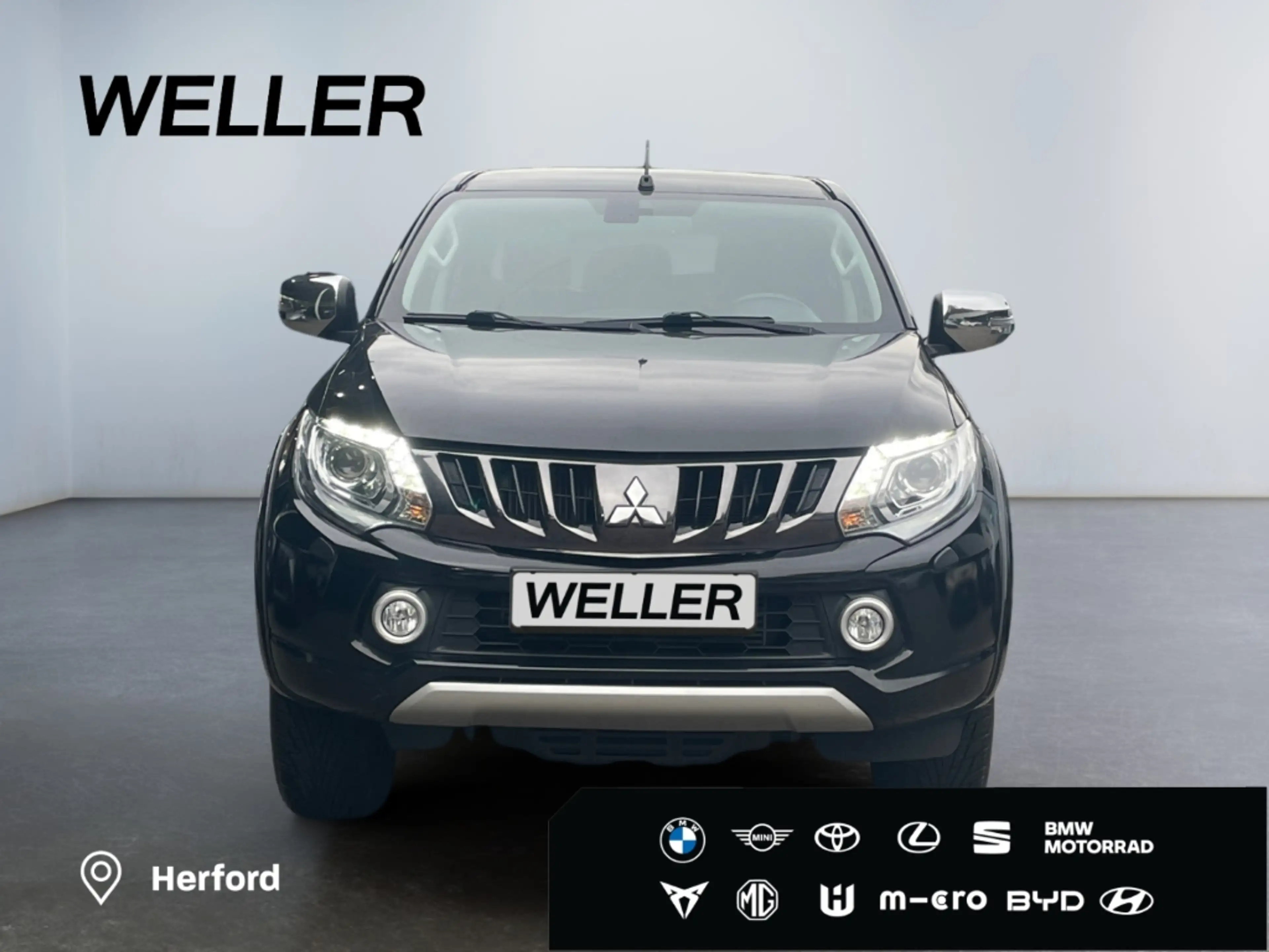 Mitsubishi L200 2.4 DI-D Top Doppelkabine 4x4 *Leder*CAM*SHZ* — photo 2