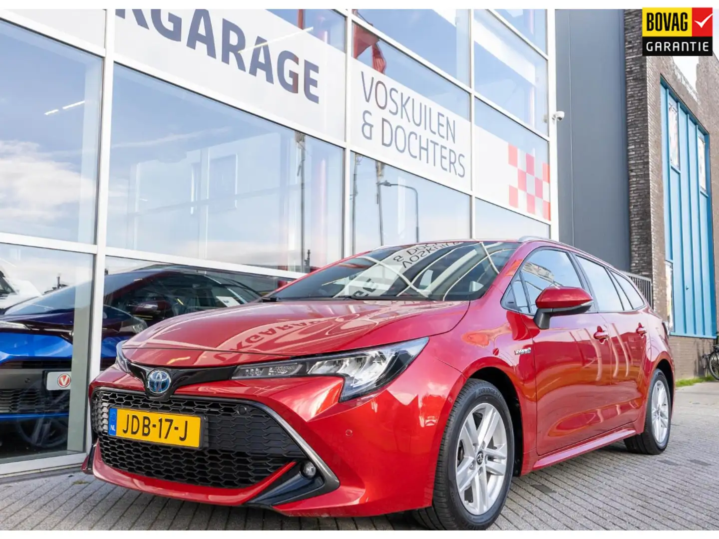 Toyota Corolla Touring Sports 1.8 Hybrid Dynamic Plus | Navigatie Rood - 1