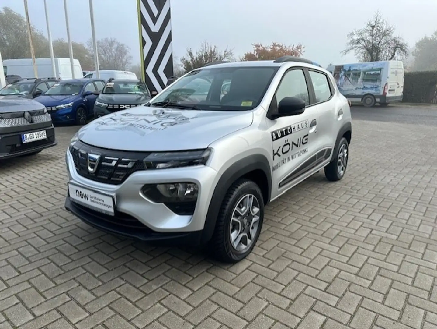 Dacia Spring Business Automatik Klima*Navi*Rückfahrcam Silber - 1