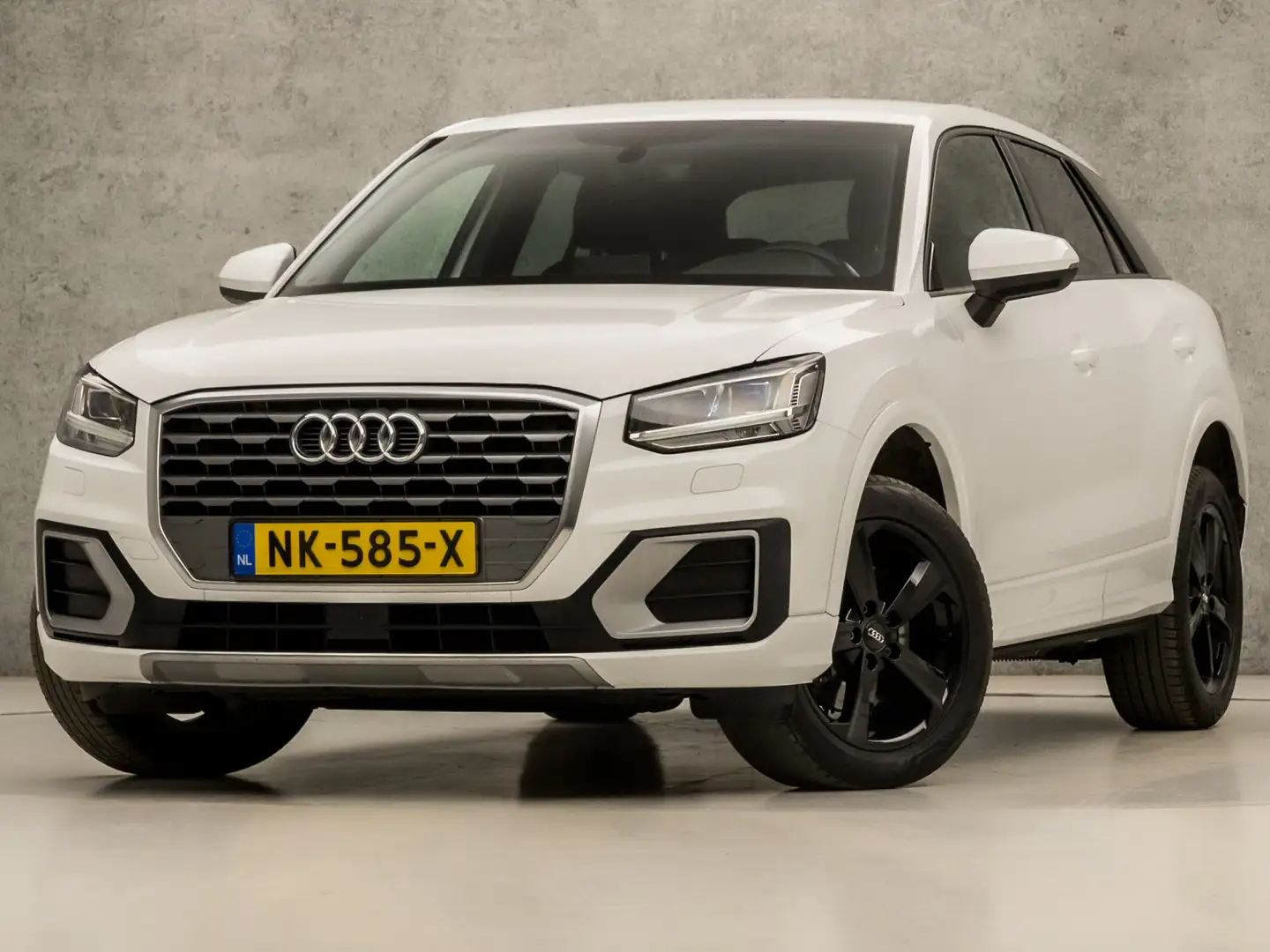 Audi Q2 1.0 TFSI Sport (GROOT NAVI, PLAT SPORTSTUUR, ZWART Wit - 1