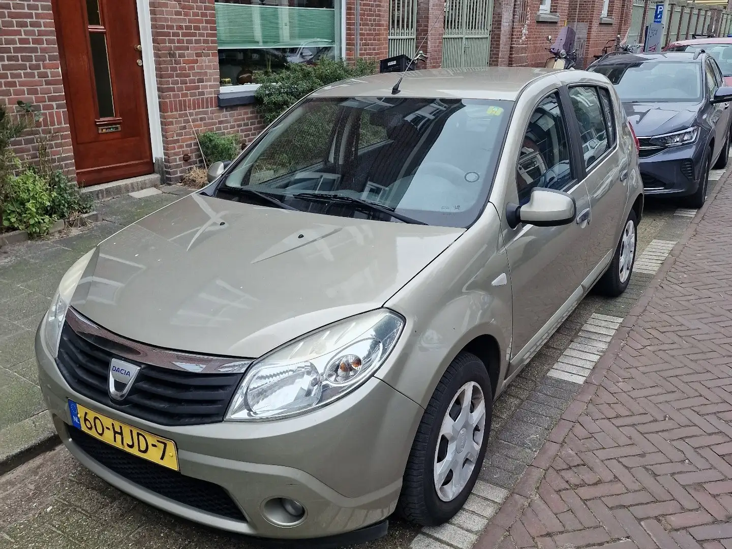 Dacia Sandero 1.6 Lauréate Brons - 1
