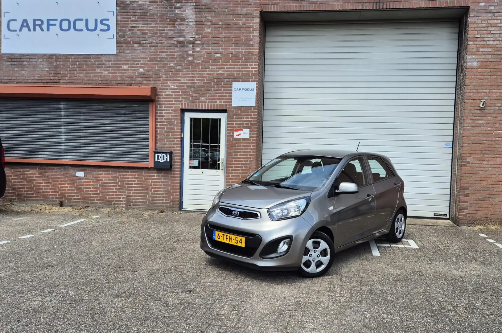 Kia Picanto 1.0 CVVT ISG Comfort Pack NAP 2e eigenaar Airco 10 Grijs - 1