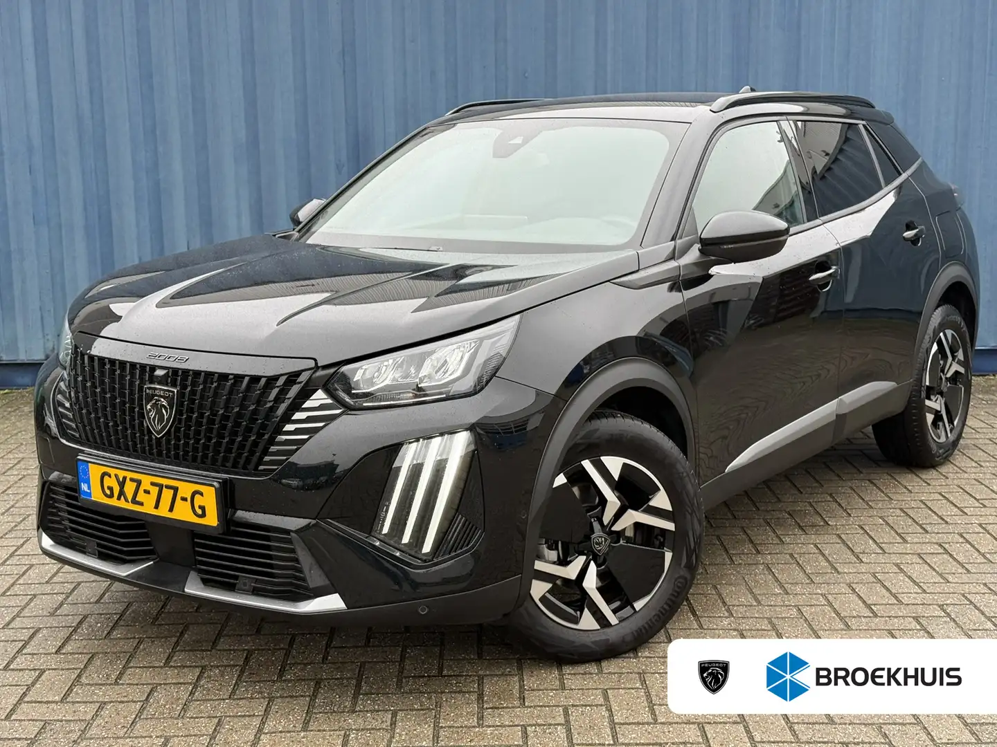 Peugeot 2008 1.2 Hybrid 136 Allure | Achteruitrijcamera | Airco Zwart - 1