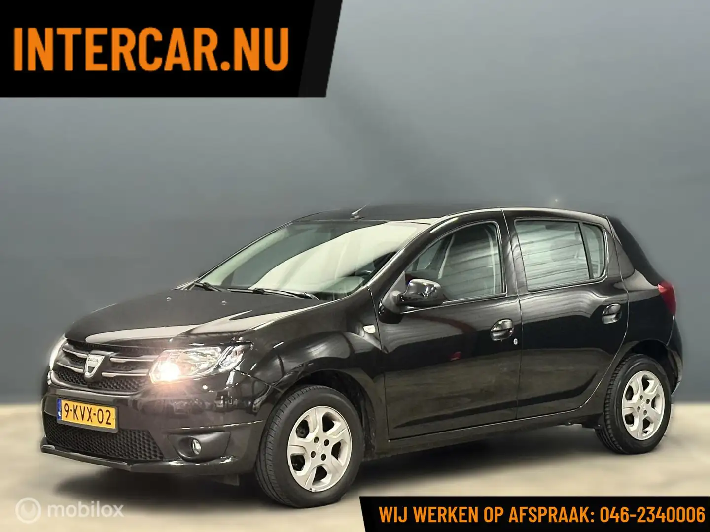Dacia Sandero 0.9 TCe Lauréate Airco / Navi / Cruise Zwart - 1