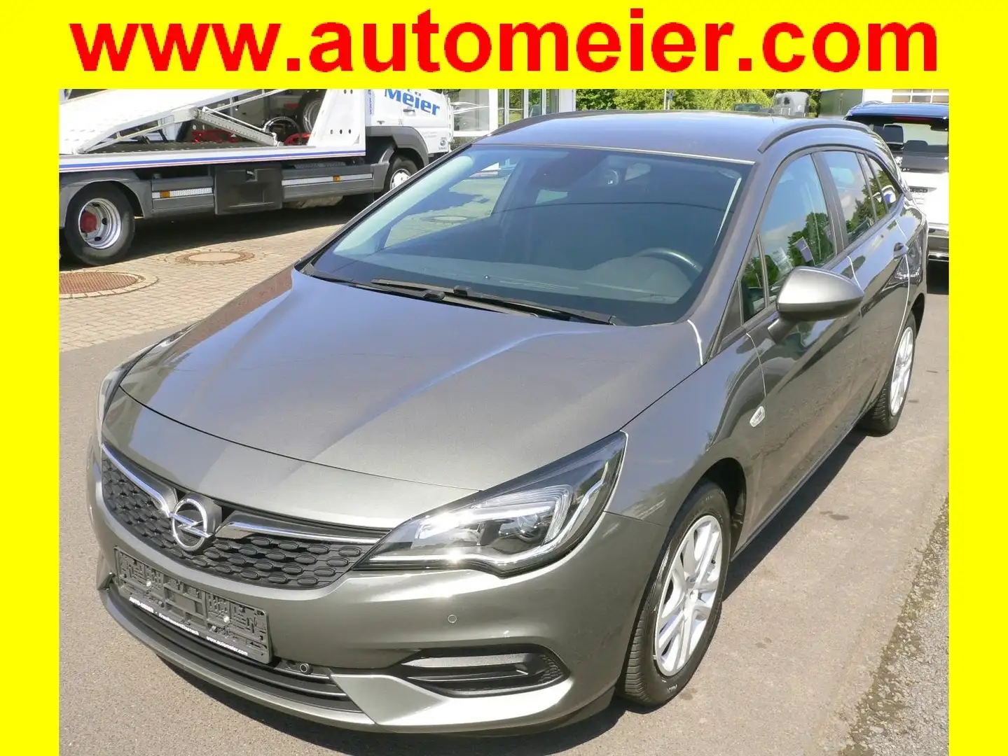 Opel Astra 1.2 Turbo Start/Stop Sports Tourer Edition + Navi Grijs - 1