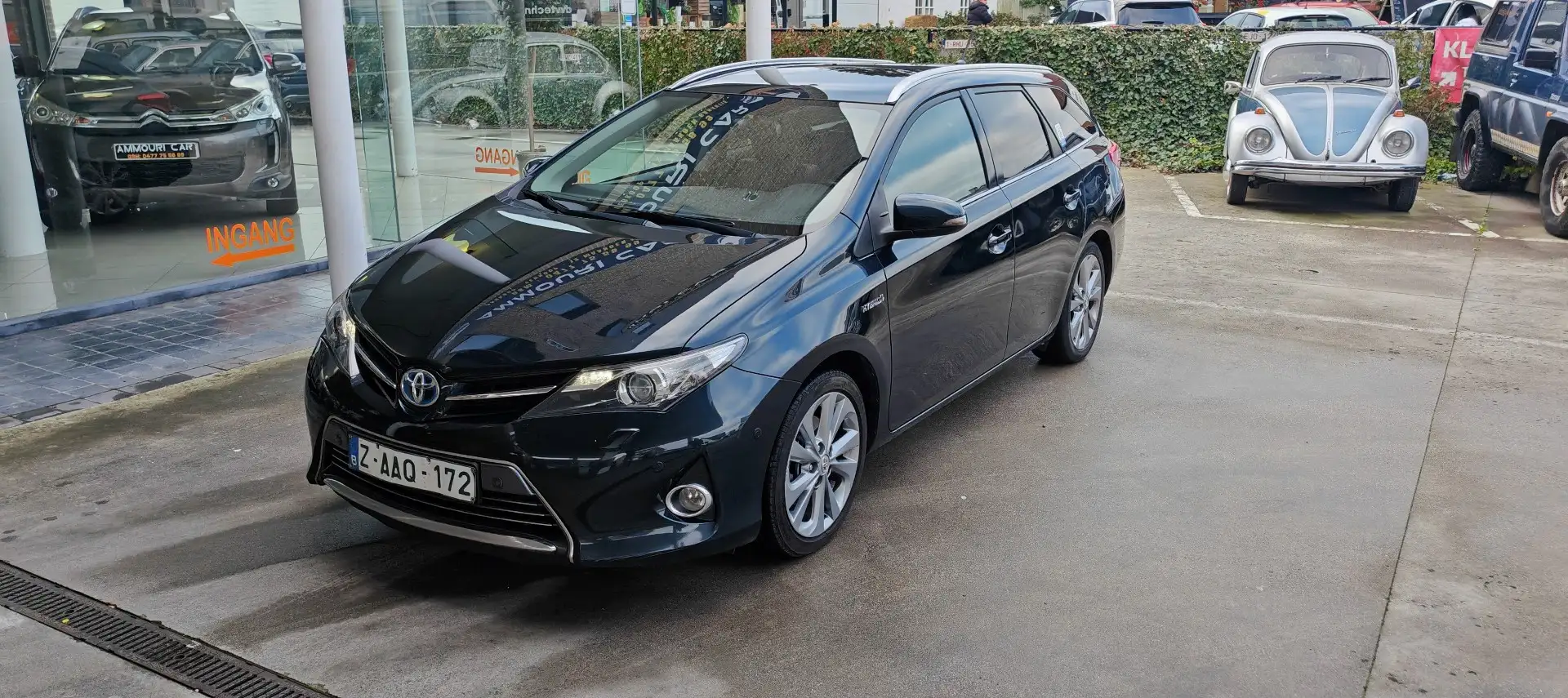 Toyota Auris 1.8 VVT-i Hybrid Automatik Touring Sports Executiv Zwart - 1