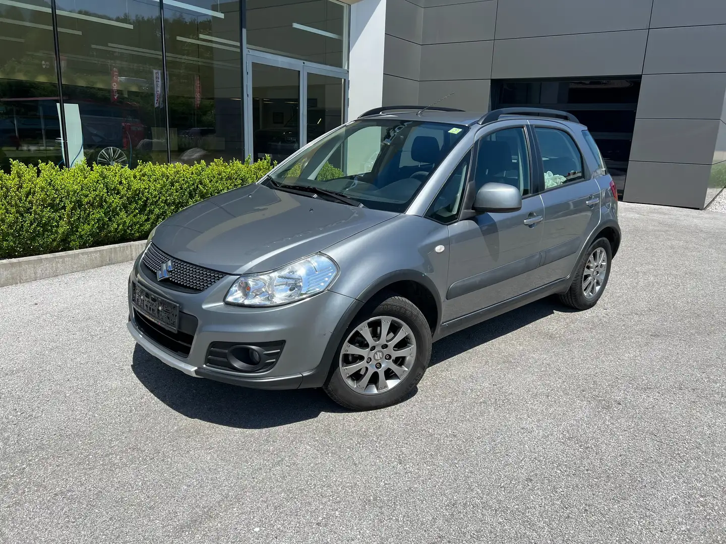 Suzuki SX4 1.6 4WD Austria Grijs - 1