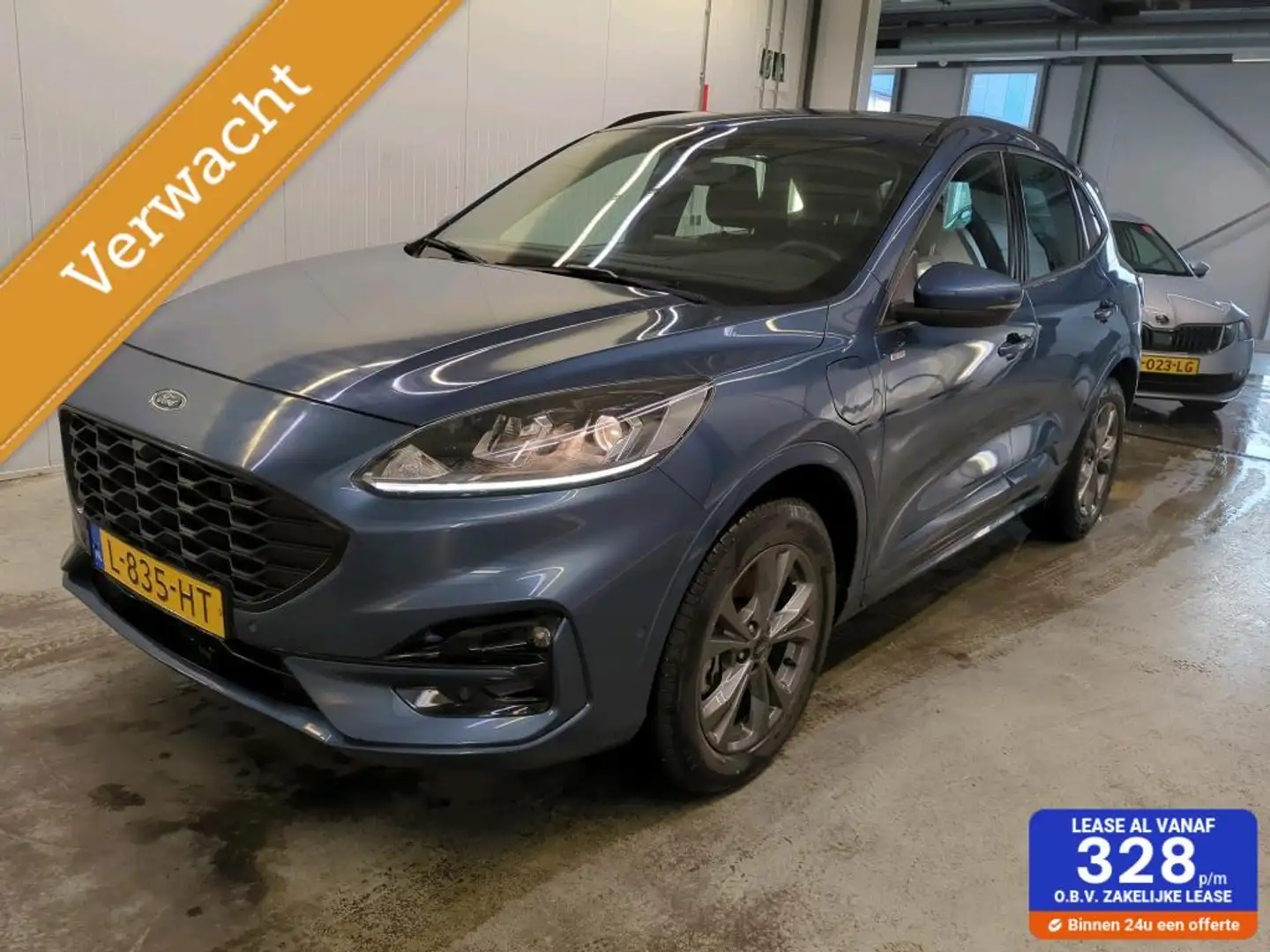 Ford Kuga 2.5 PHEV ST-Line | Adaptive Cruise | Camera | Blauw - 1