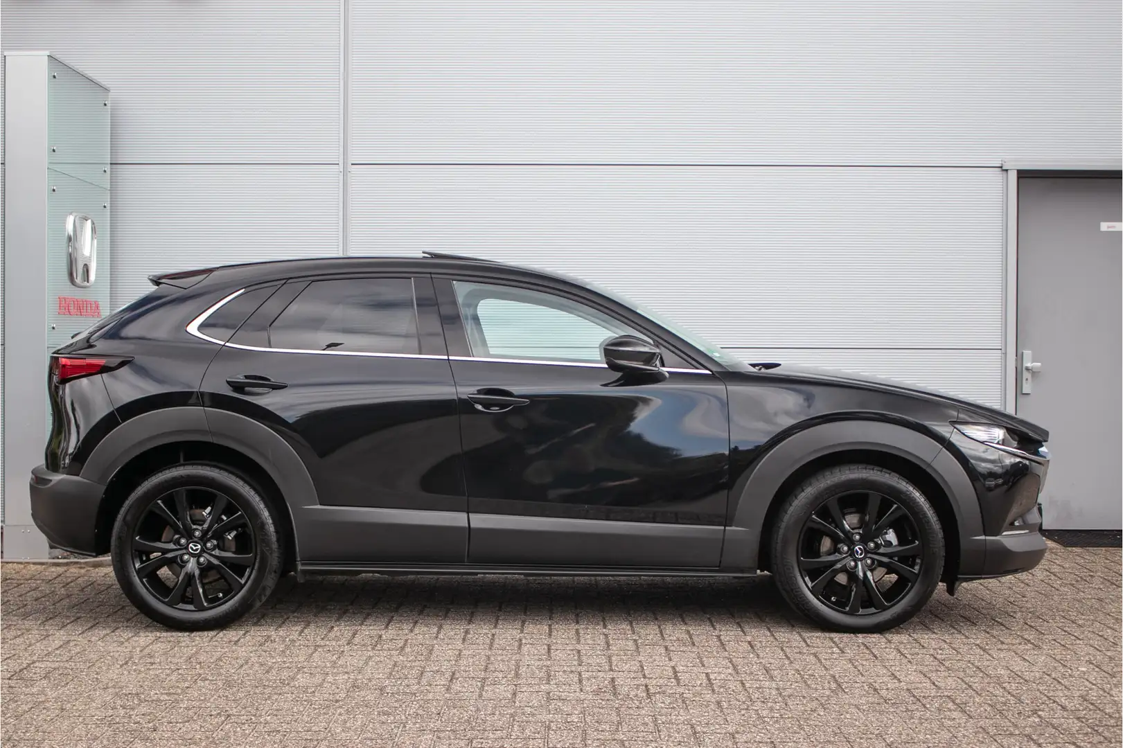 Mazda CX-30 2.0 e-SkyActiv-X M Hybrid Luxury aut. AWD All-in r Zwart - 2