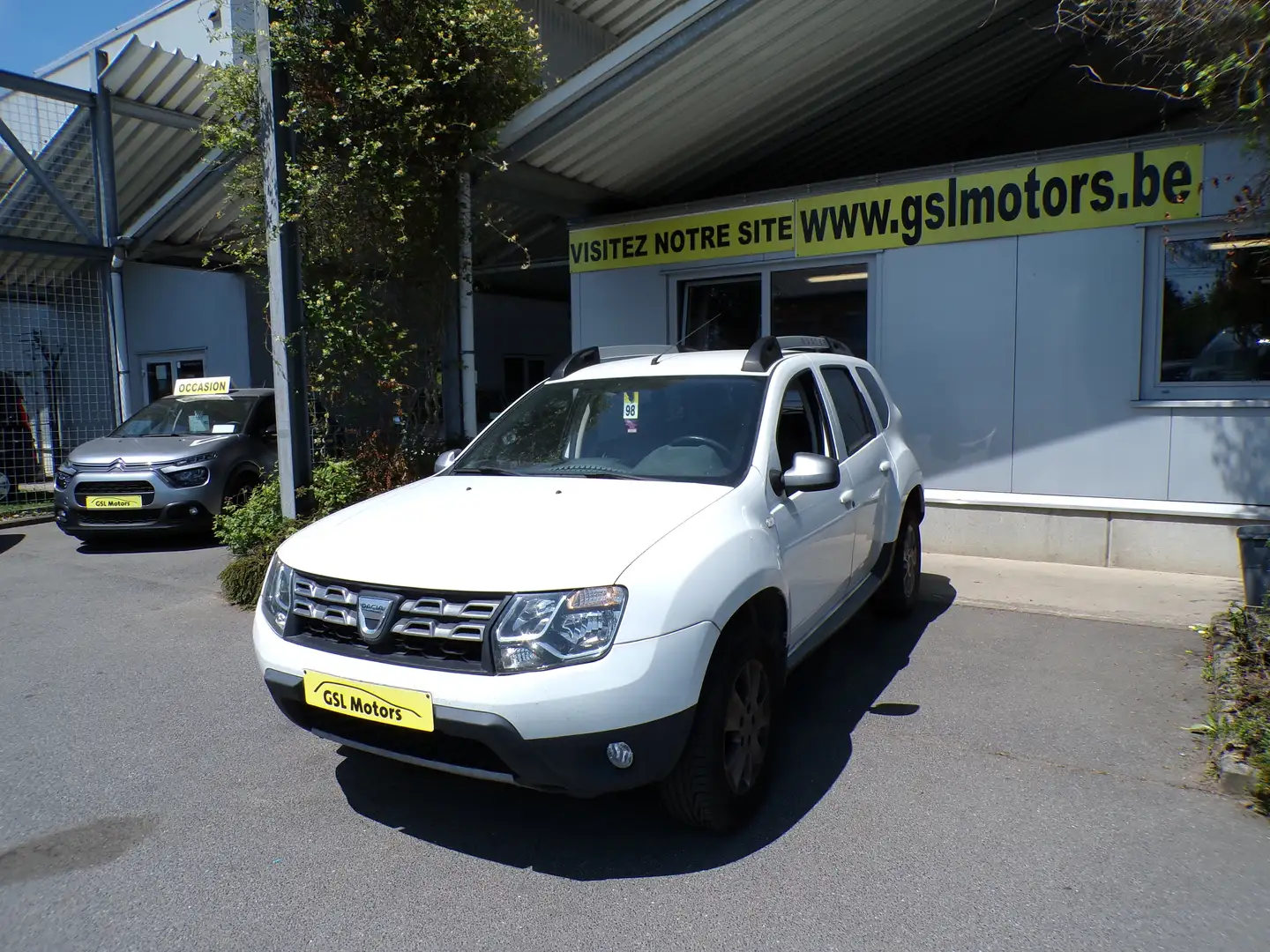 Dacia Duster 1.5 dCi 110cv blanc 12/16 82345km Airco GPS Cruise Wit - 1