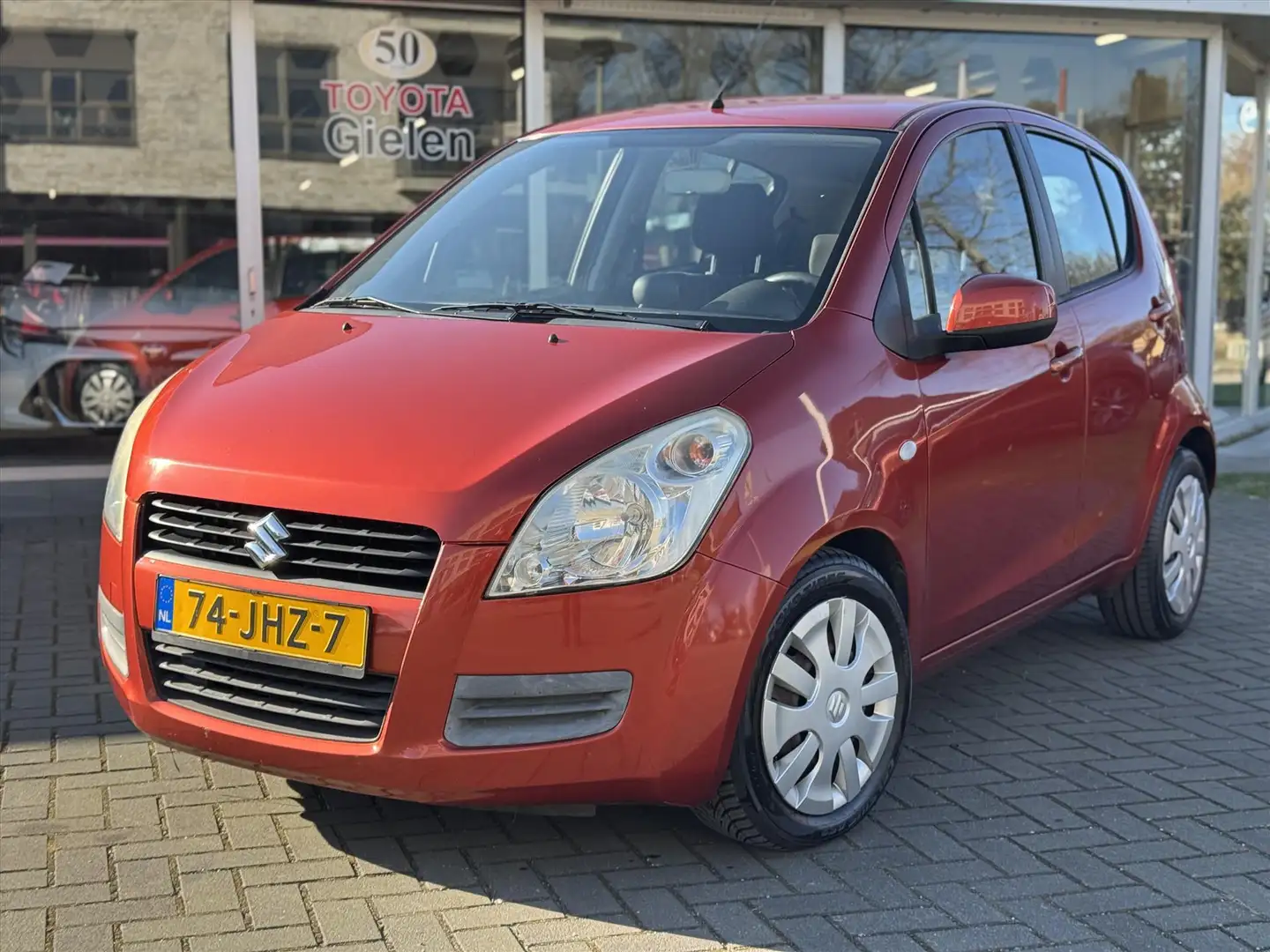 Suzuki Splash 1.2 63KW Comfort | Airco, Elektrische ramen voorzi Arancione - 2