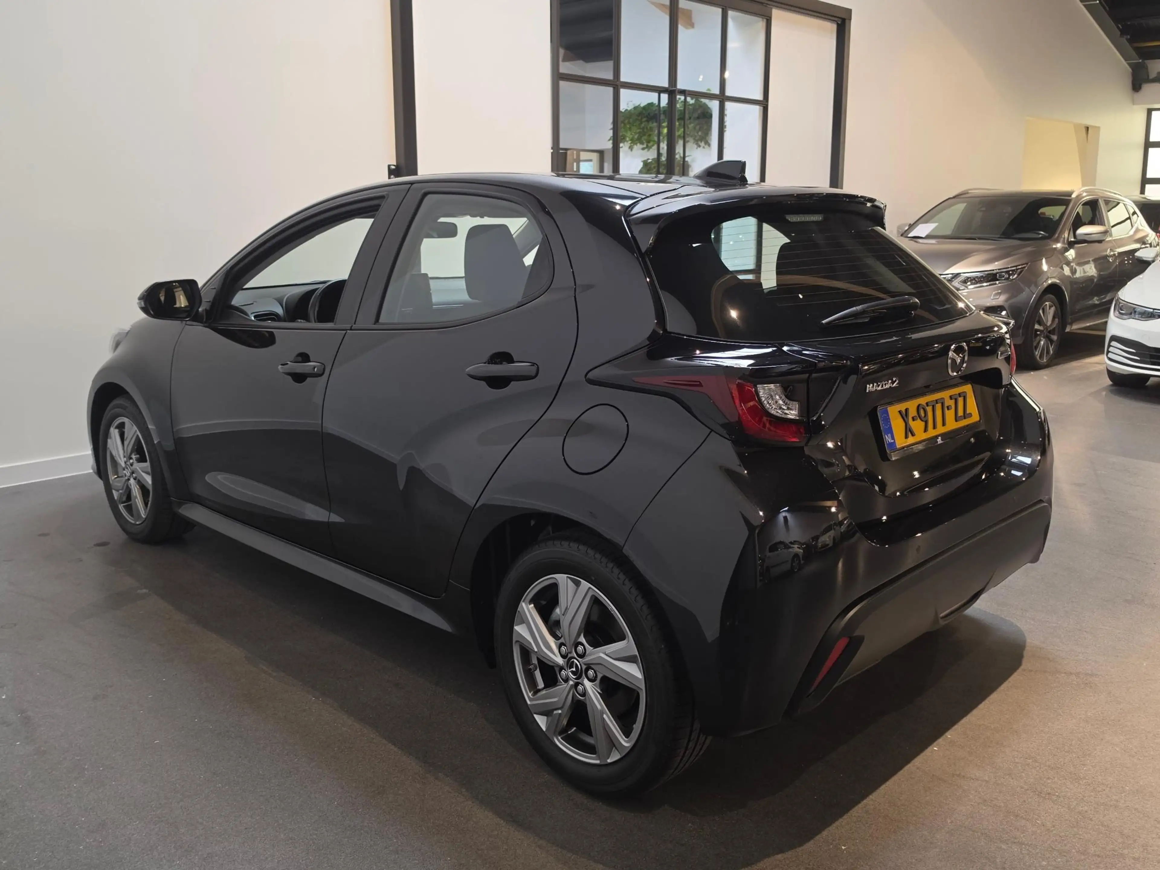 Mazda 2 Hybrid 1.5 Exclusive-line - Stoel & Stuurverwarmin — photo 7