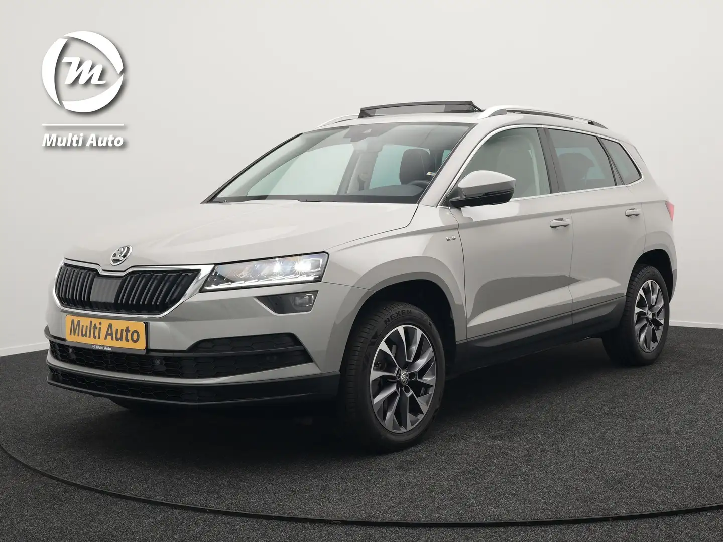 Skoda Karoq 1.5 TSI ACT Style 150pk DSG | Panodak | Trekhaak a Grijs - 1