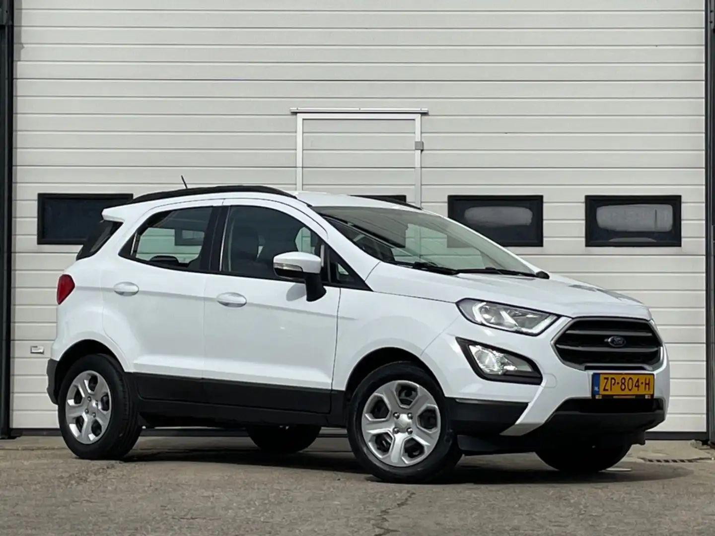 Ford EcoSport 1.0 EB TREND ULTIMATE NAVI/AIRCO/PDC Wit - 1