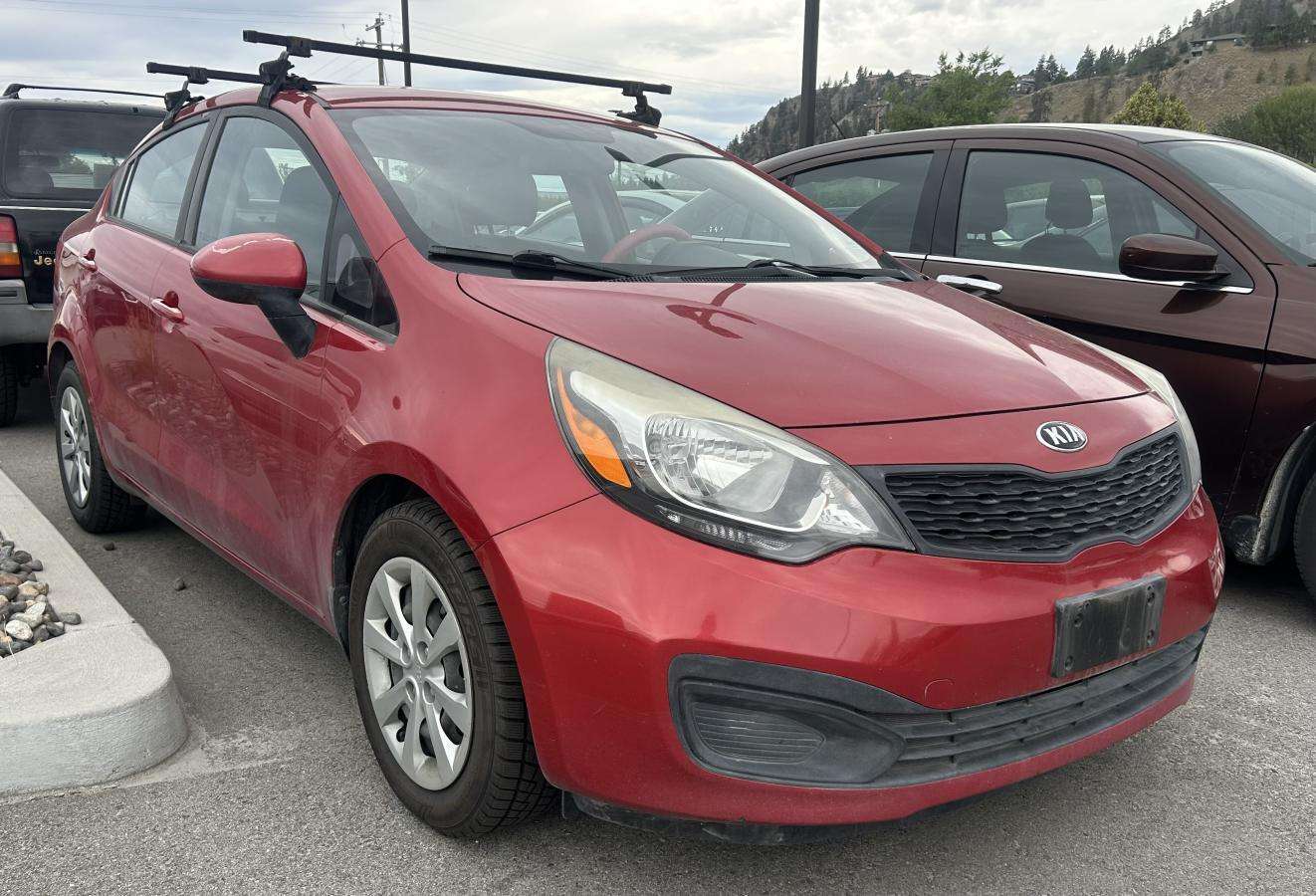 Red 2015 Kia Rio Sedan Front-Wheel Drive Automatic