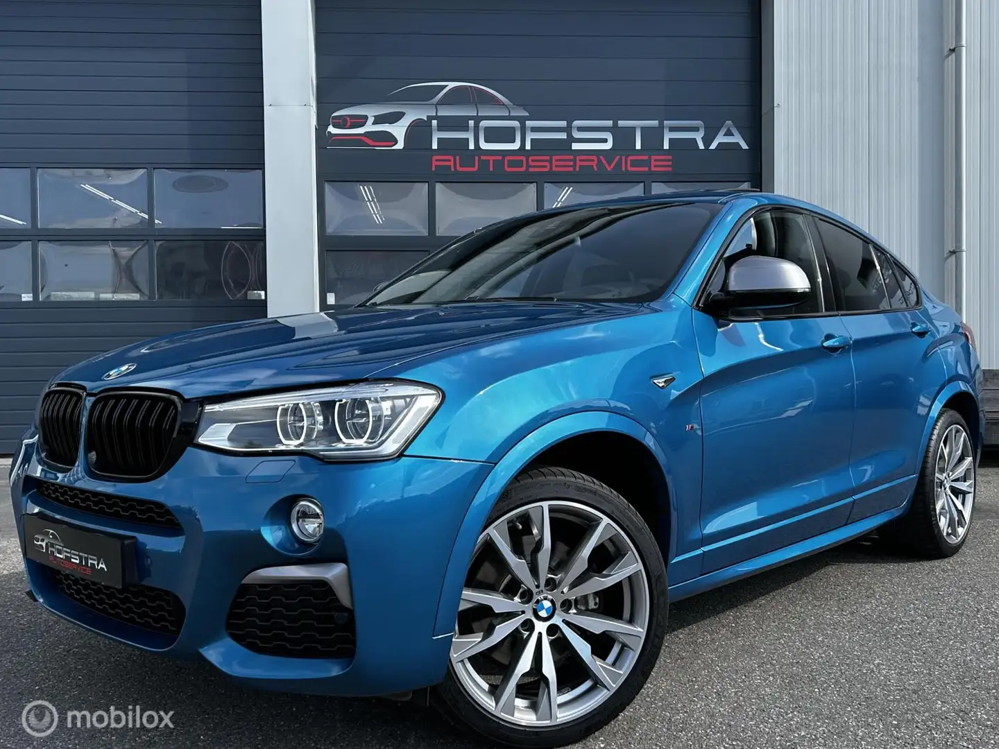 BMW X4 M40i High Executive Pano H&K Trekhk Camera Head-Up Blauw - 1
