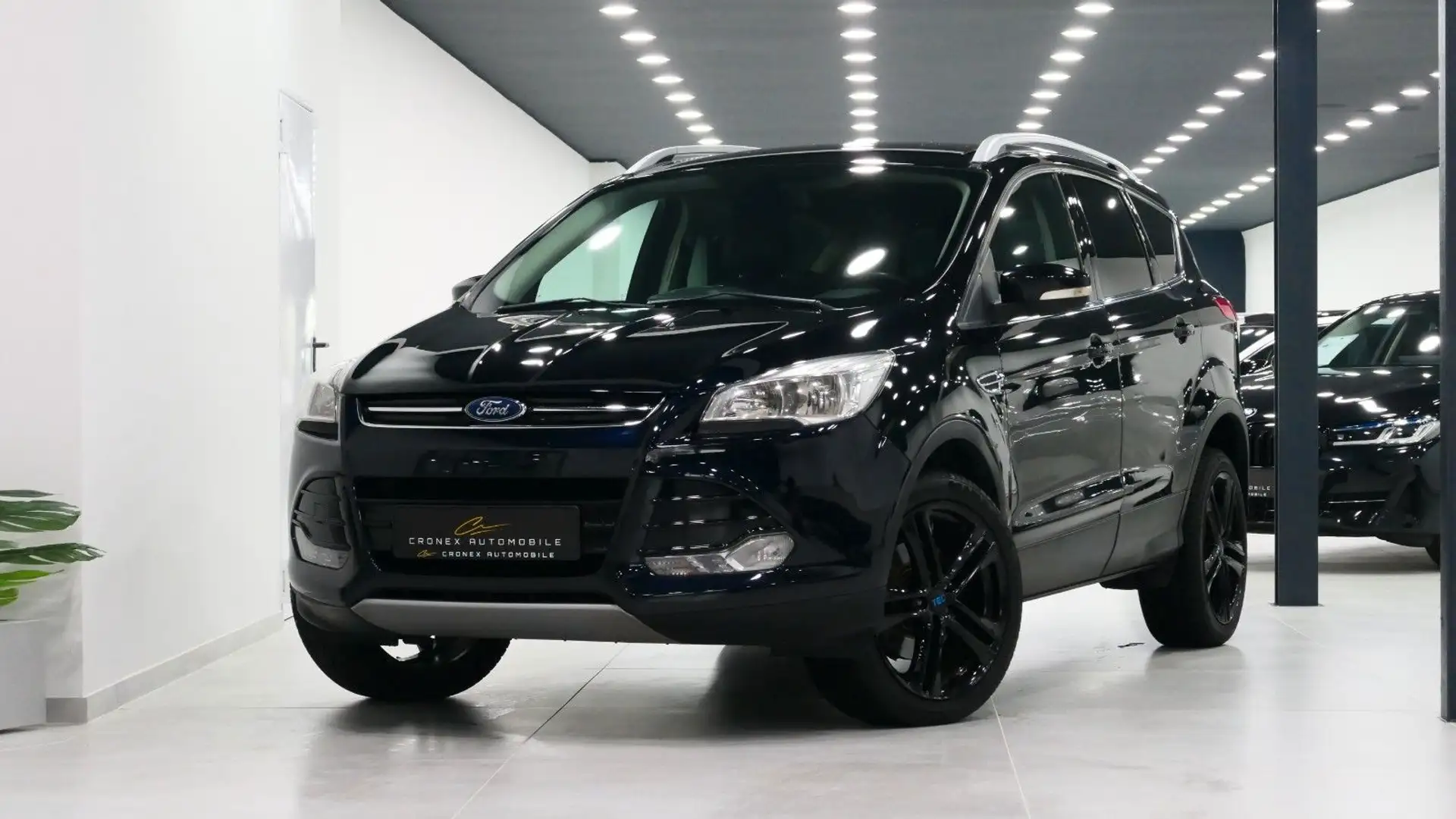 Ford Kuga Titanium 4x4*PDC*Navi*Teilleder*DesignPaket Negro - 1