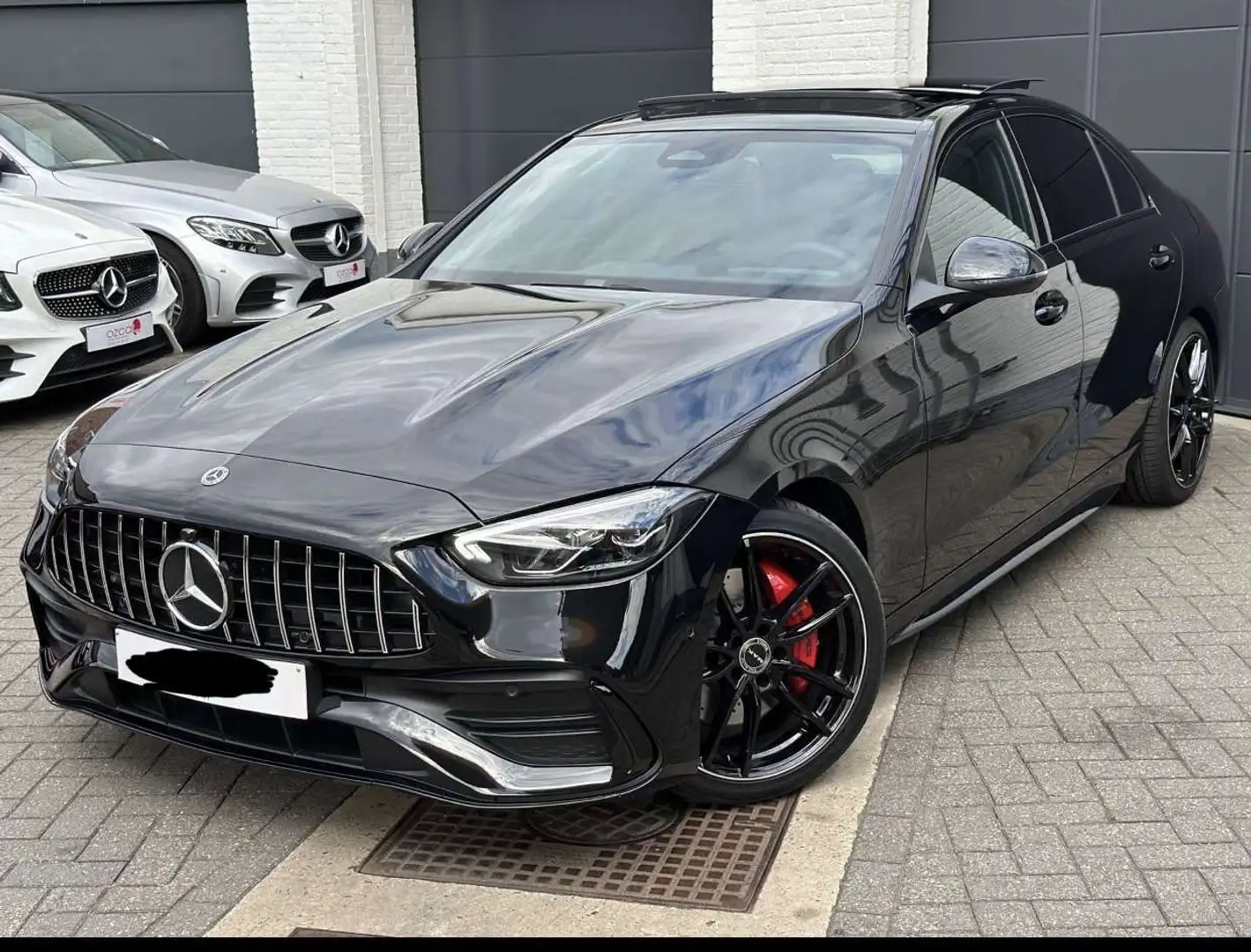 Mercedes-Benz C 200 d 9G-TRONIC AMG Line Advanced Zwart - 1