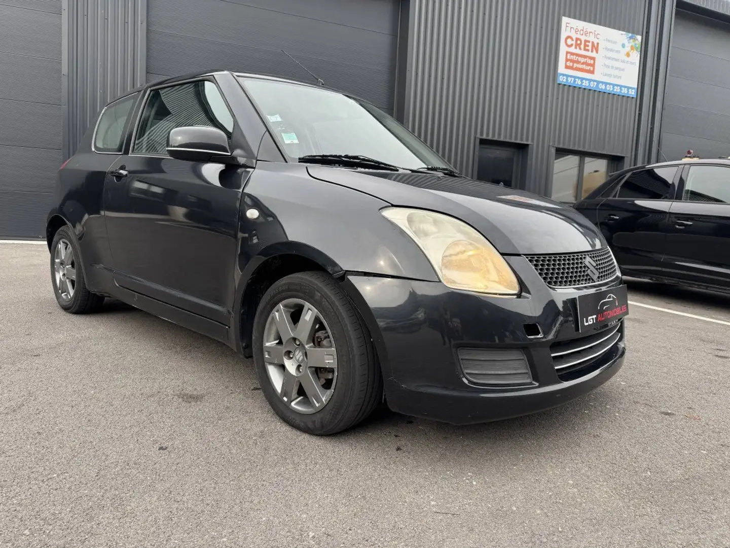 Suzuki Swift II 1.3 VVT GL 3p Zwart - 1