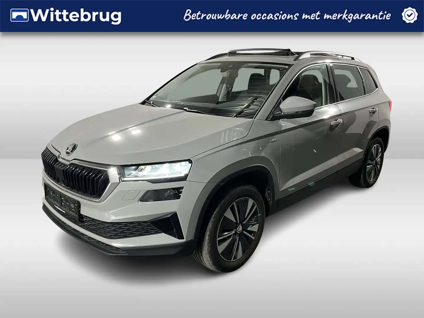 Skoda Karoq 1.0 TSI Ambition / PANO/ STUUR+STOEL VERWARMING/ P Gris - 1