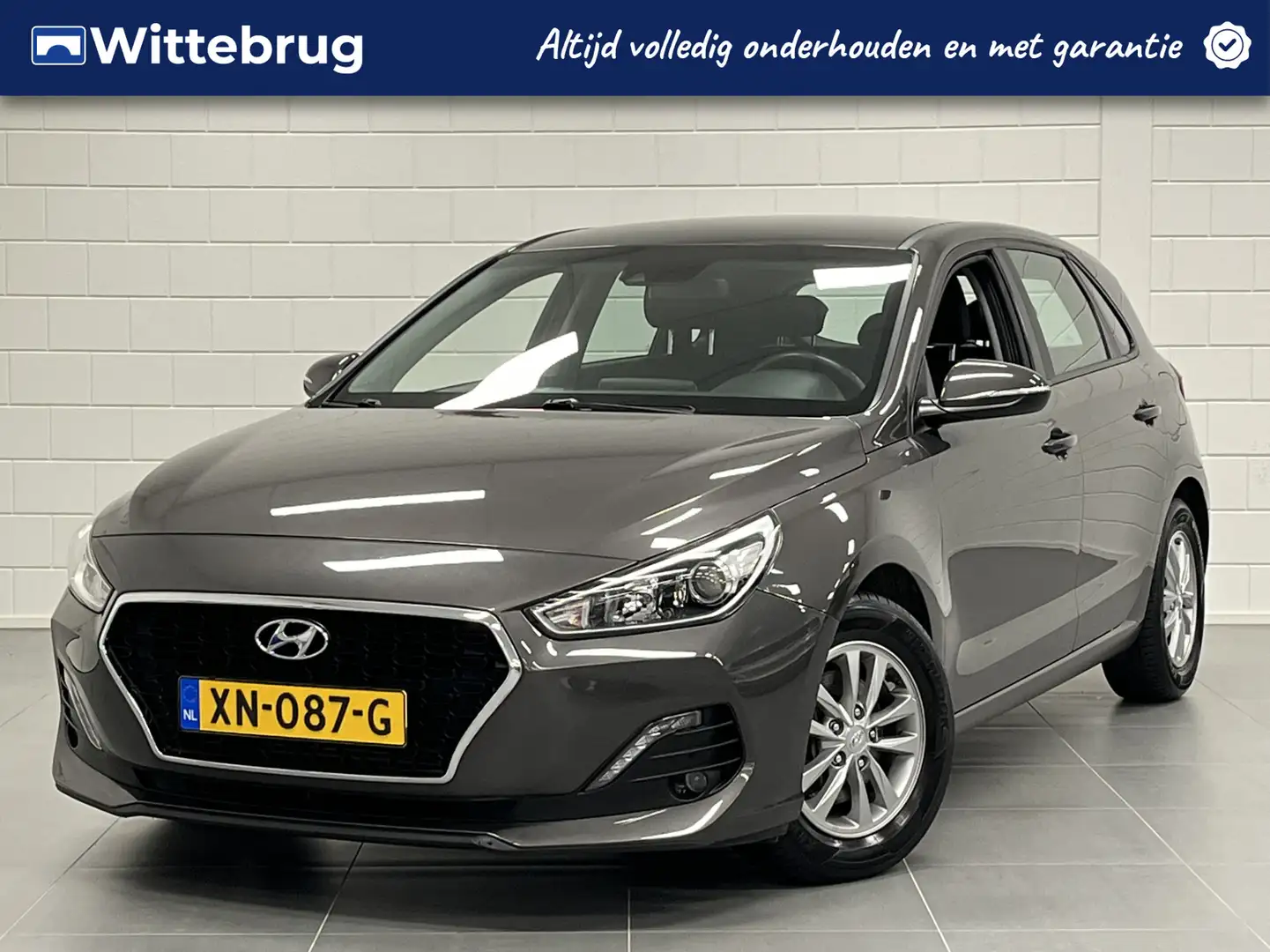 Hyundai i30 1.0 T-GDI Comfort NAVIGATIE | PARKEERCAMERA | DEAL Bruin - 1