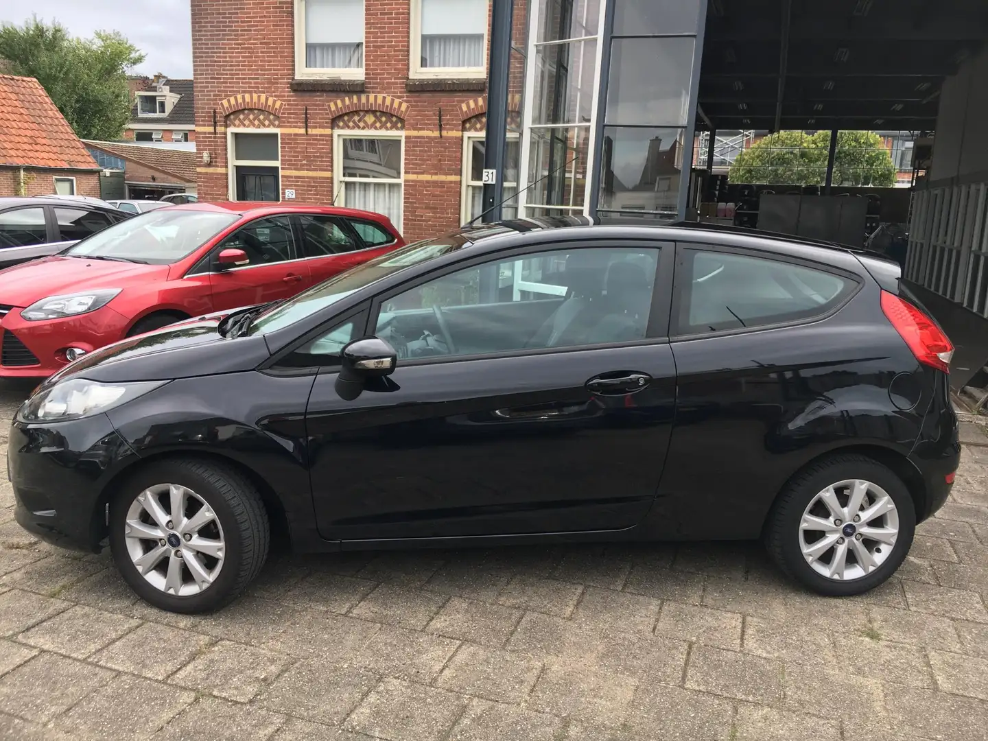Ford Fiesta 1.25 Limited Airco | Cool & Sound Pack | Centrale Zwart - 2
