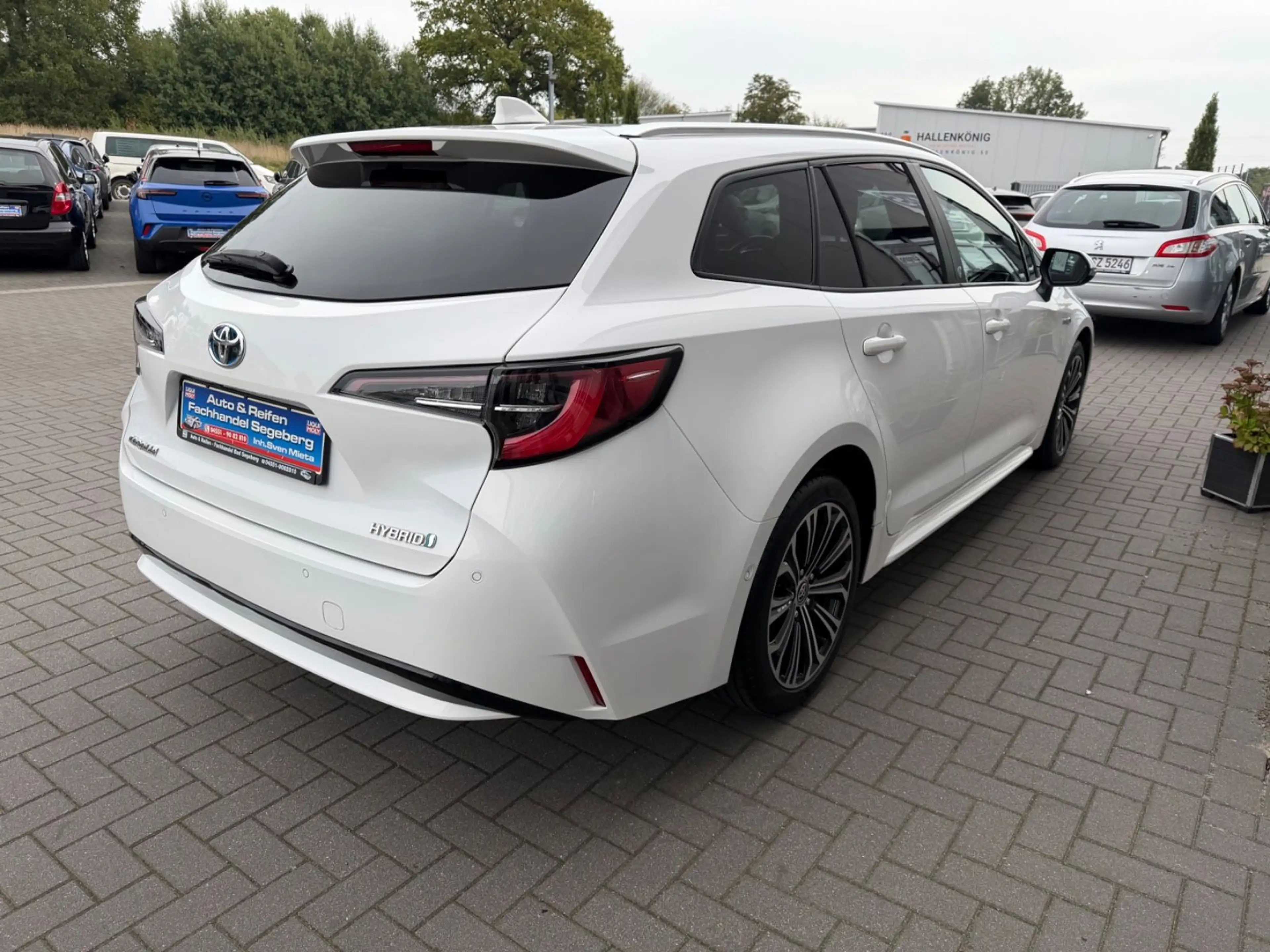 Toyota Corolla Touring Sports Hybrid Business Edition — photo 7