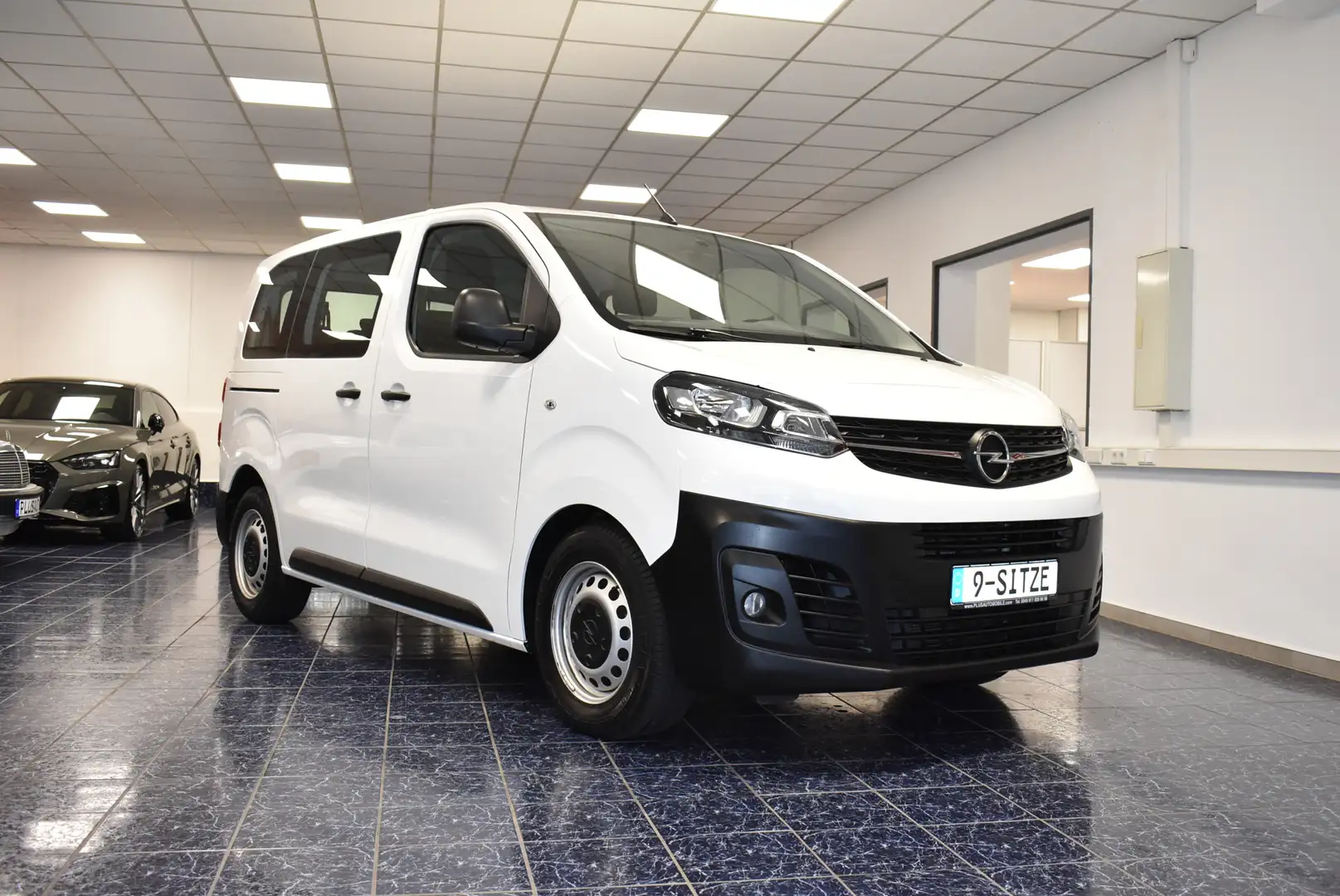 Opel Vivaro S 9-Sitze Navi Klima Temp PDC 1-Hand Weiß - 1