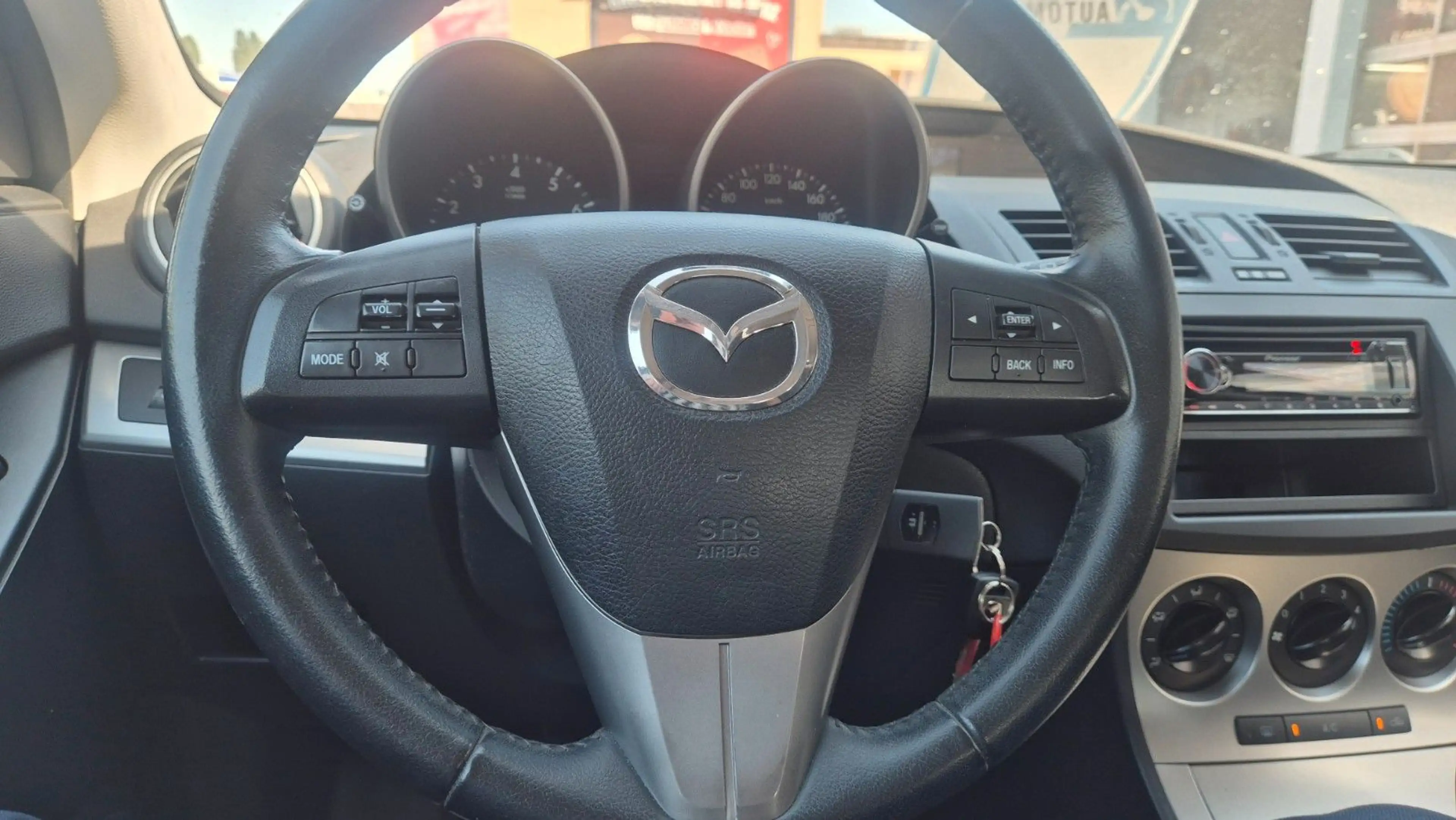 Mazda 3 Lim. Active 1.6 — photo 12