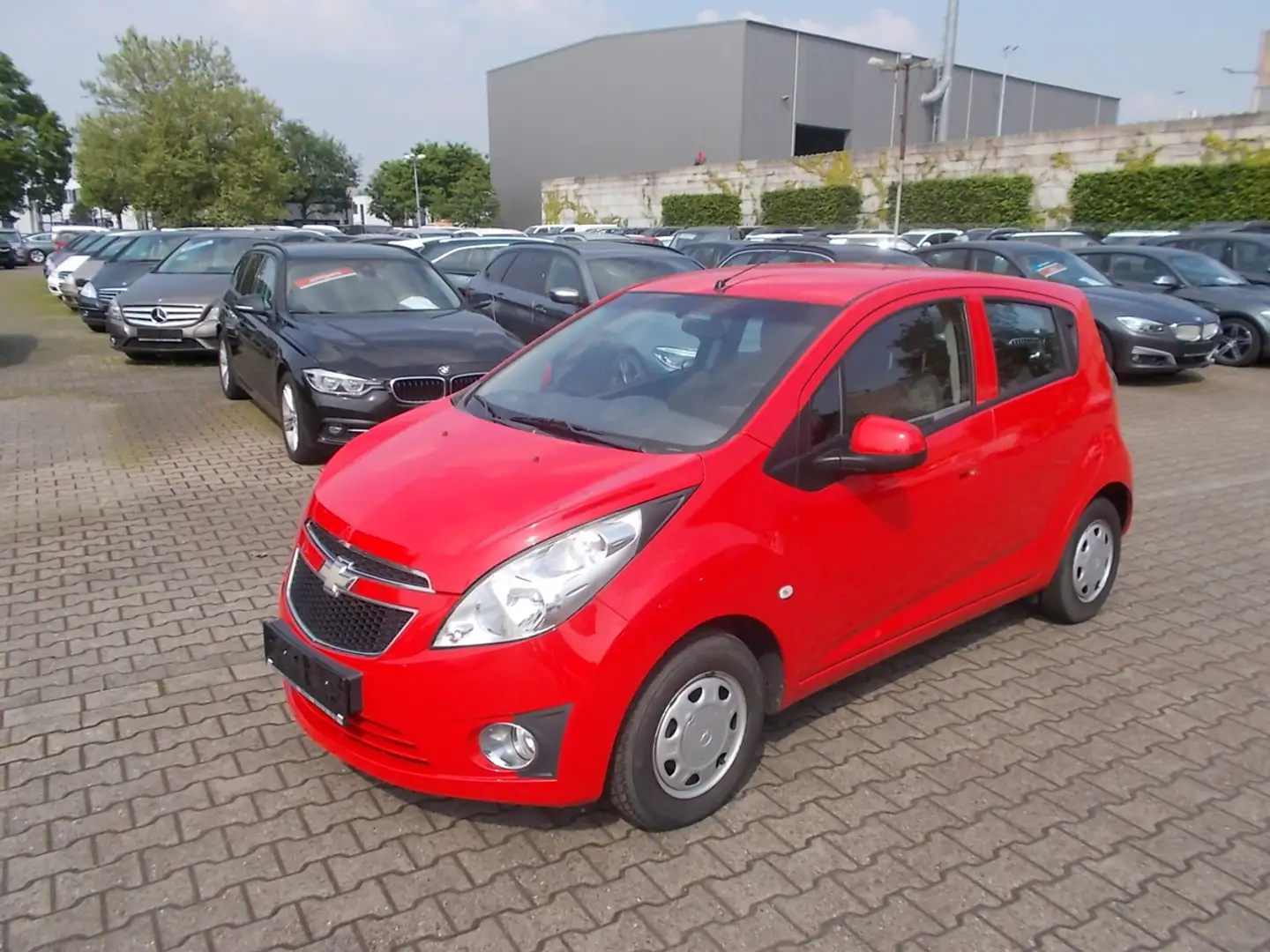 Chevrolet Spark LS 1.0, Klima, Radio CD, USB, Allwetter Rot - 1