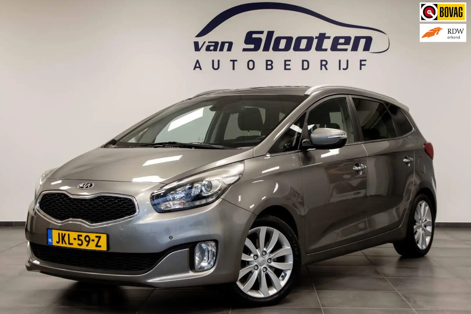 Kia Carens 1.6 GDi DynamicLine |7 persoons | Navi | Clima | L Grijs - 1