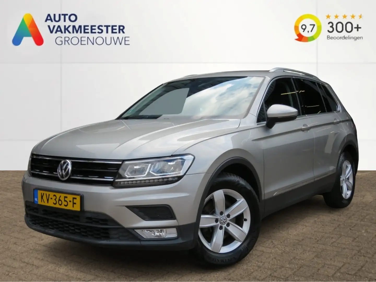 Volkswagen Tiguan 1.4 TSI CON. SERIES / Led / Navi / Wegklap.haak / Grijs - 1