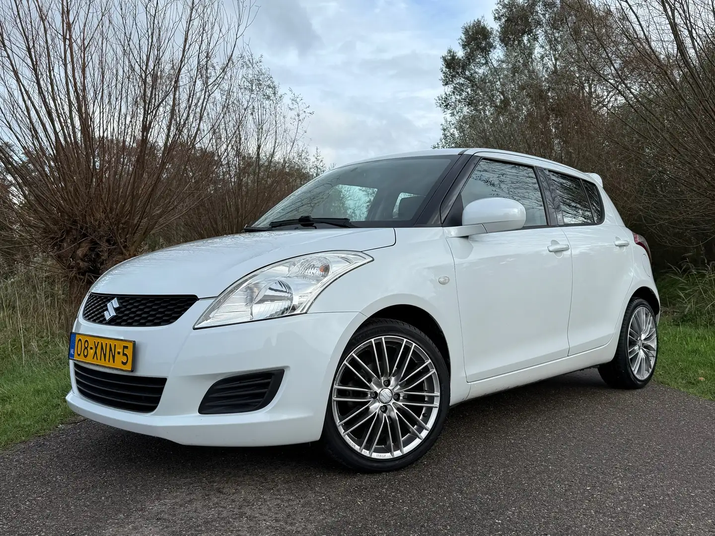 Suzuki Swift 1.2 Summer EASSS / Navi / Airco / Stoelverwarming Blanc - 1