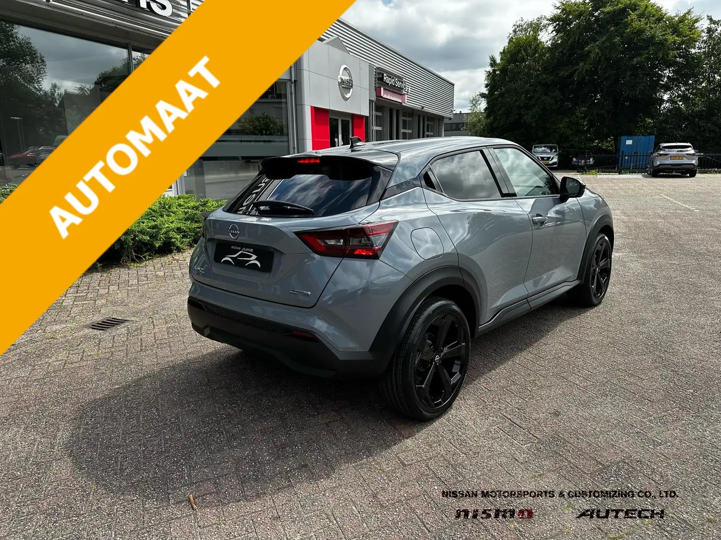 Nissan Juke Hybrid 143pk Tekna Cold & Sound pack Grijs - 2