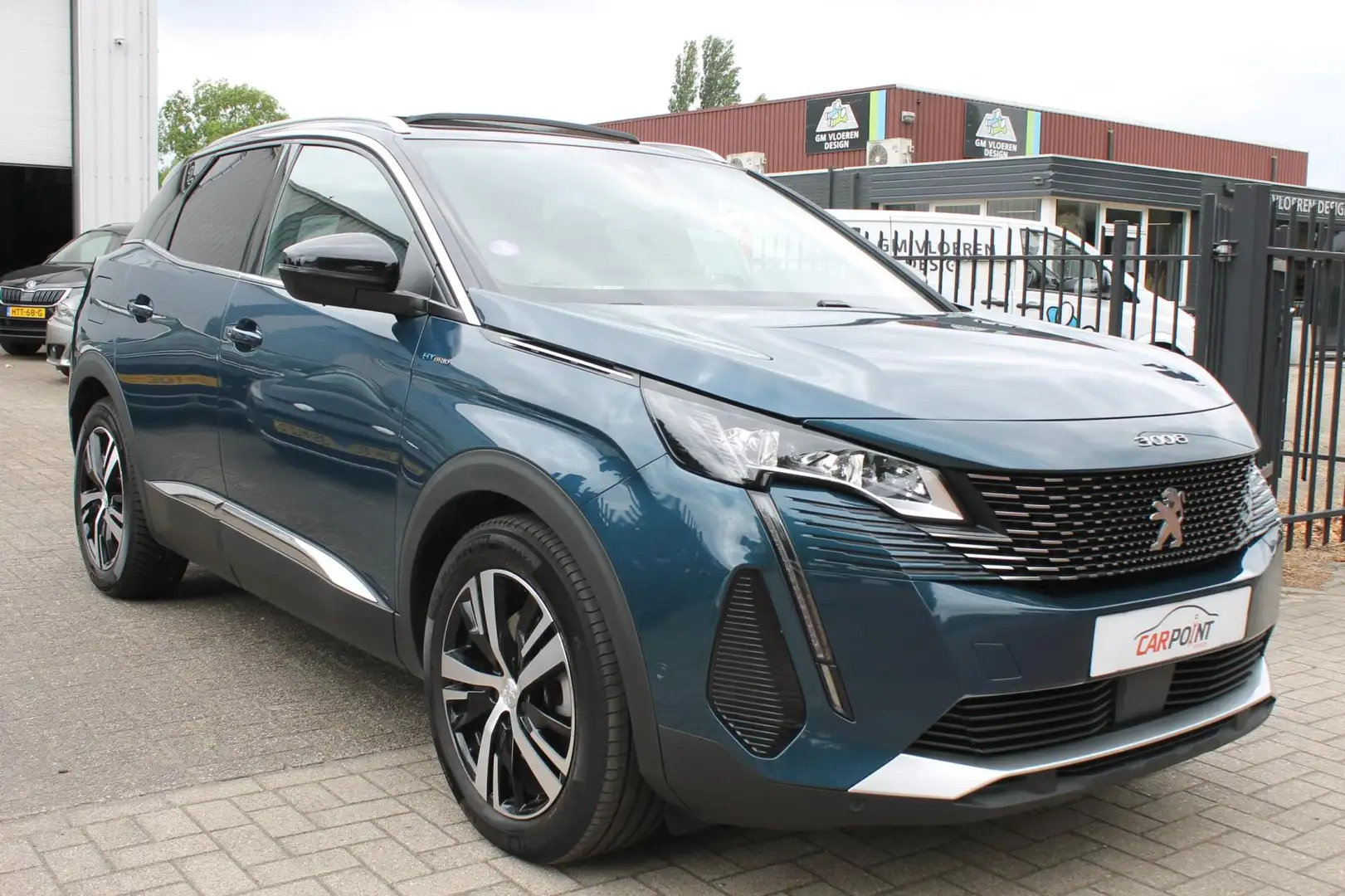 Peugeot 3008 1.6 HYbrid 225 GT Pano Massage Leer 360 Groen - 2
