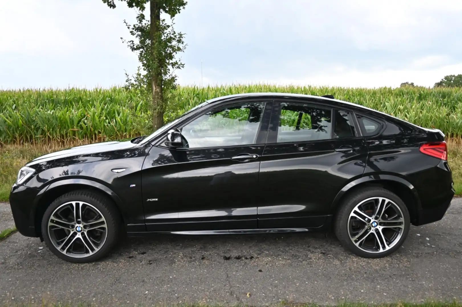 BMW X4 X-Drive20i High Exec. | M-SPORT | NL auto | Leder Zwart - 2