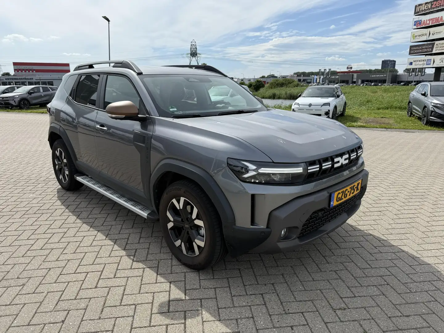 Dacia Duster extreme hybrid 140 | Dodehoekdetectie | Parkeersen Grijs - 2