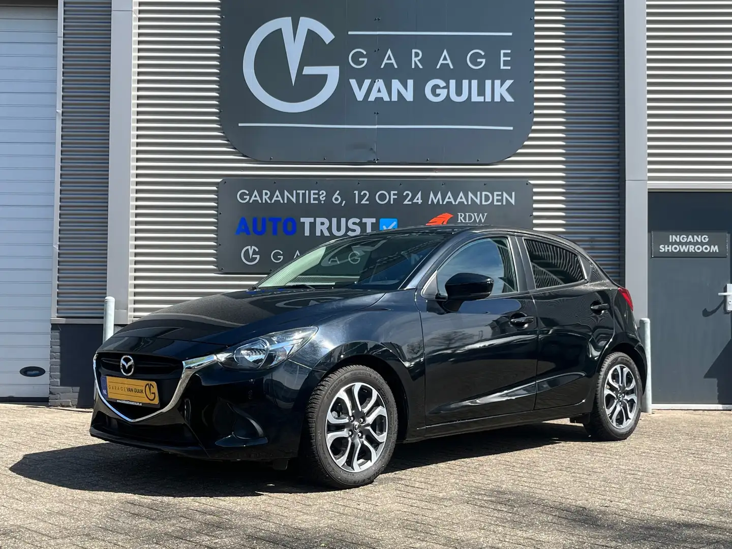 Mazda 2 1.5 90PK Skyactiv-G Clima,Cruise,Navi,Pdc,Stoelver Zwart - 1