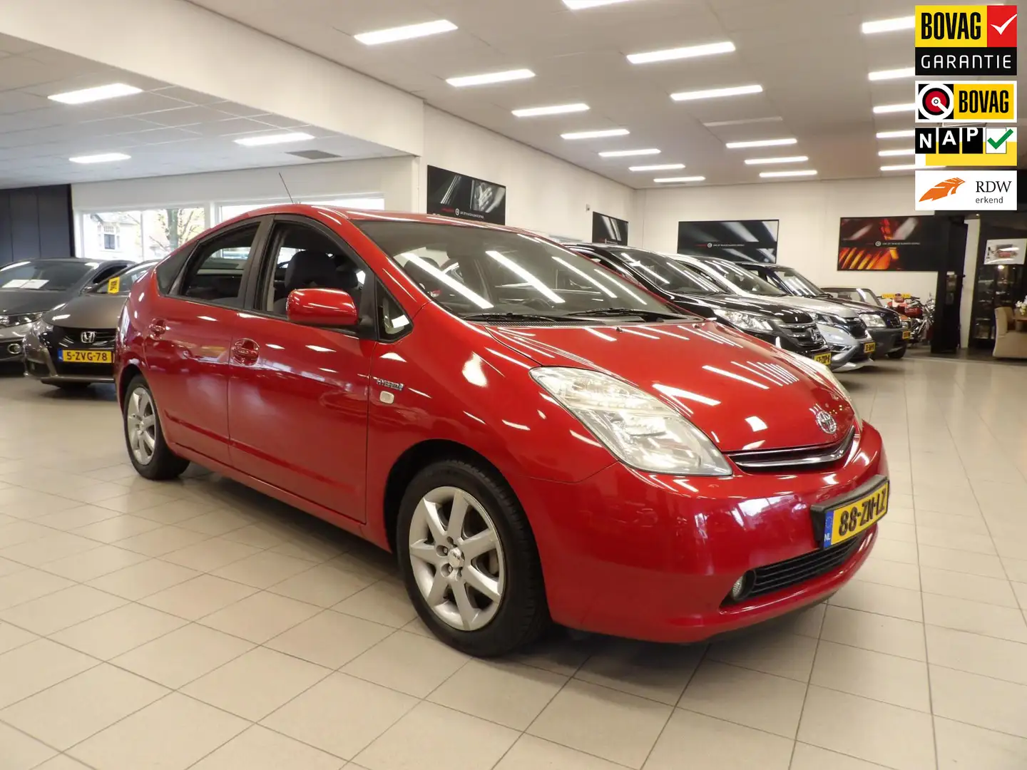 Toyota Prius 1.5 VVT-i Business Edition 75000 km EERSTE EIGENAA Rood - 1