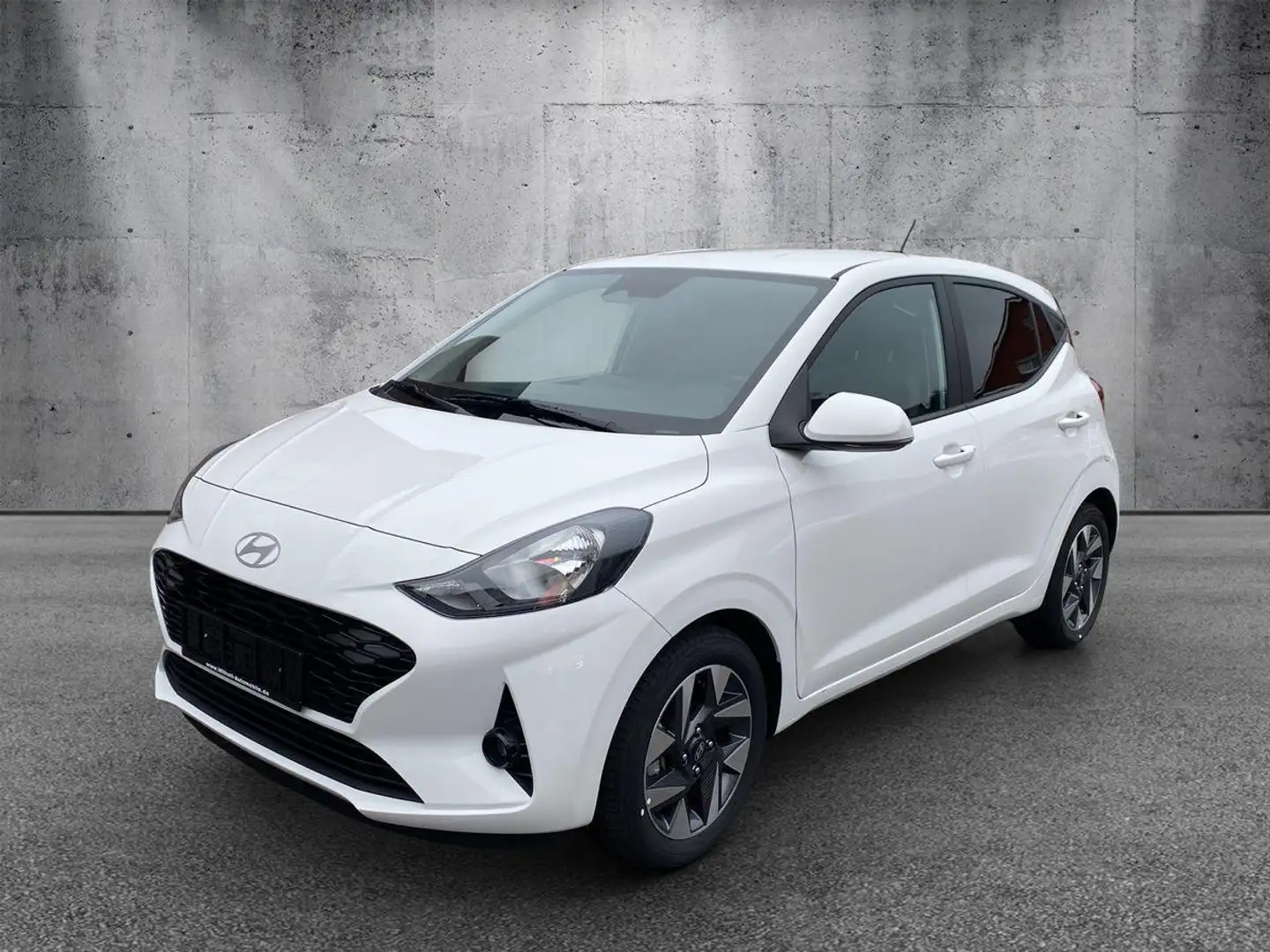Hyundai i10 Navi / R.Kamera / Winterp. / Klimaauto Weiß - 1