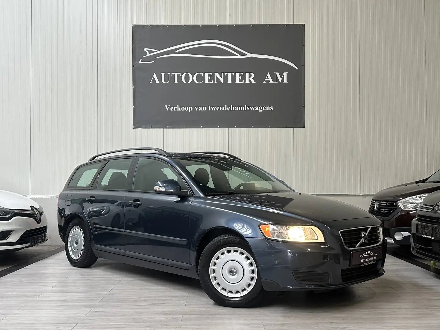 Volvo V50 1.6 D DPF DRIVe NAVI * TREKHAAK 1Ste eigenaar Blauw - 1