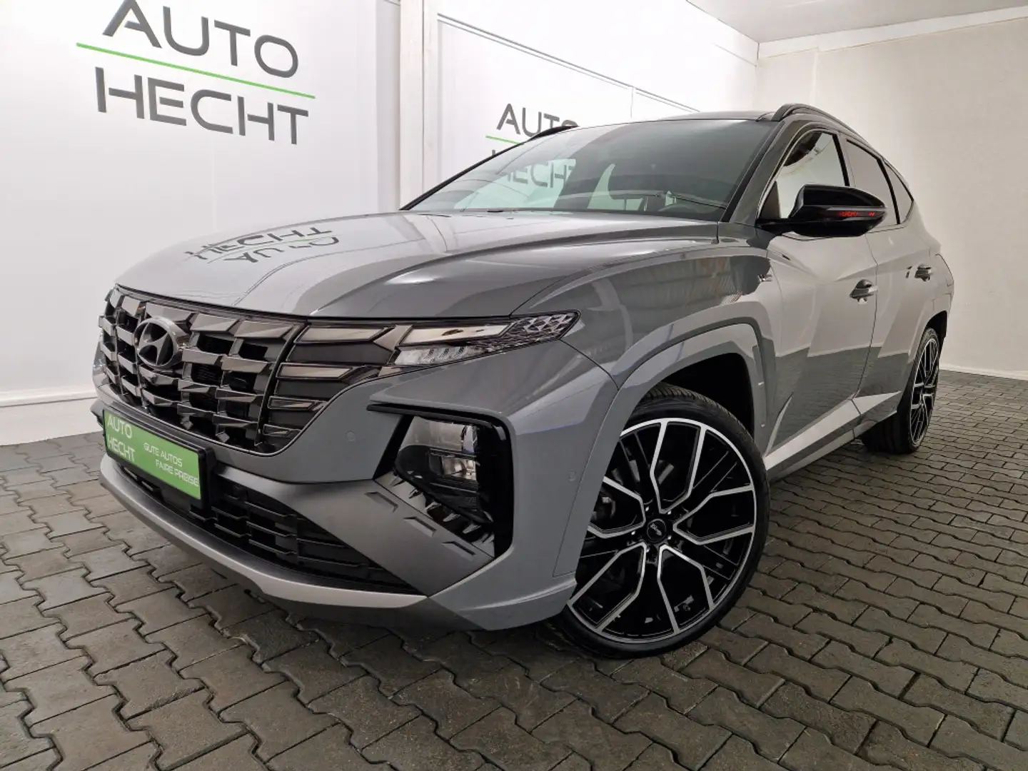 Hyundai TUCSON 1,6T-GDi Hybrid 4WD N-Line ACC, AHK, Pano Grijs - 1
