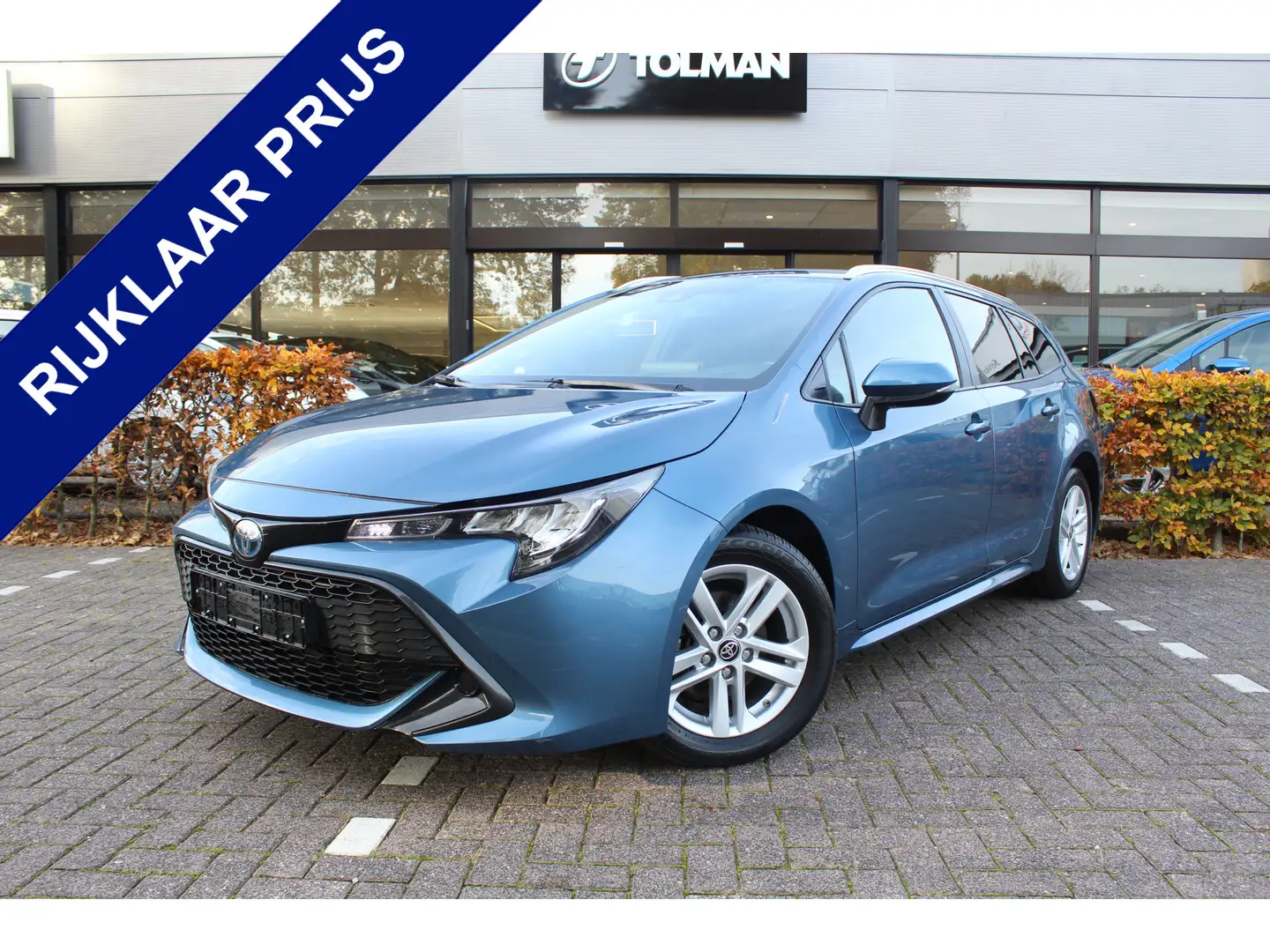 Toyota Corolla Touring Sports 1.8 Hybrid Dynamic Special | Rijkla Blauw - 1