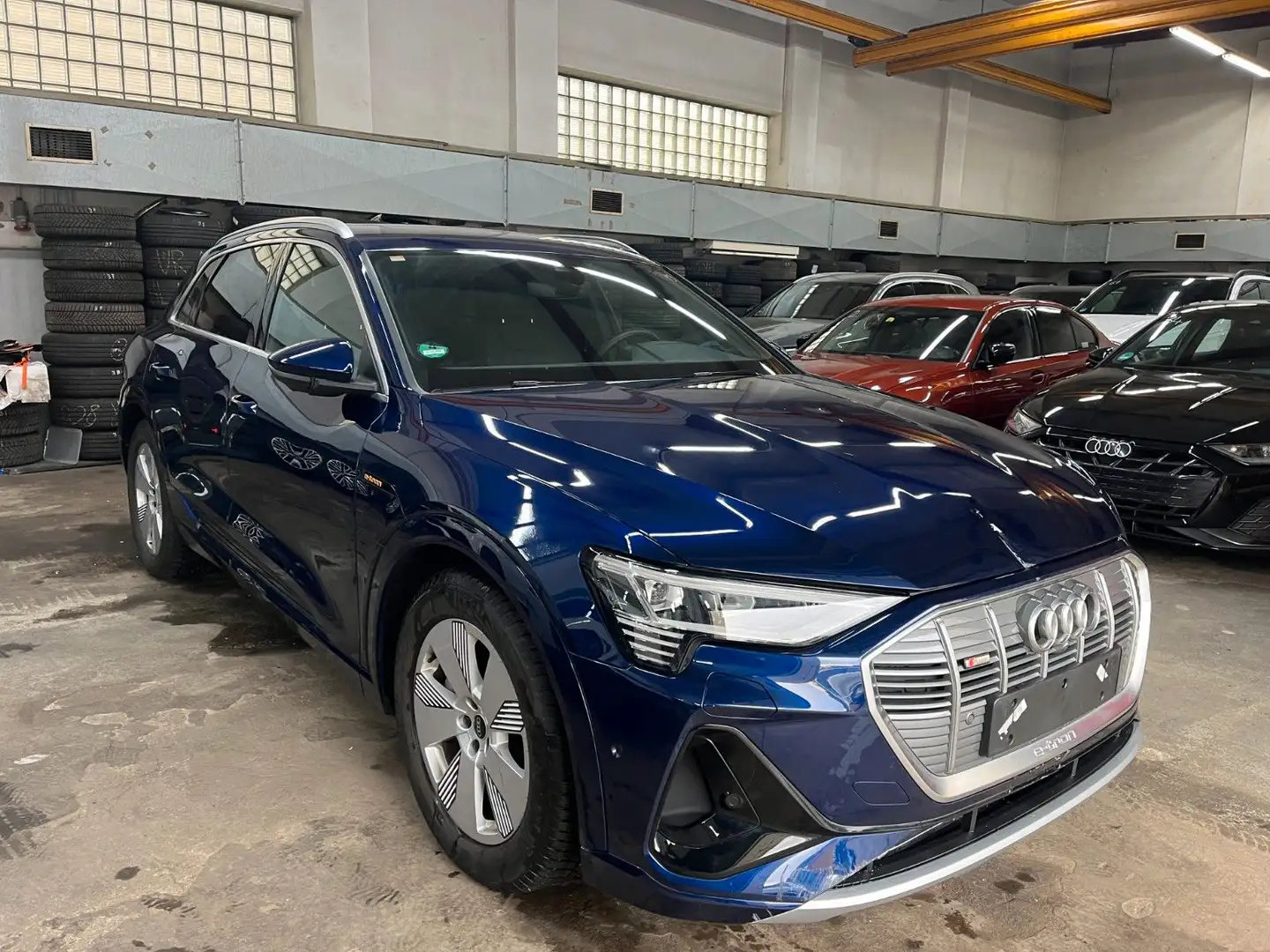 Audi e-tron 55 quattro S line Matrix Pano 360° Blauw - 1