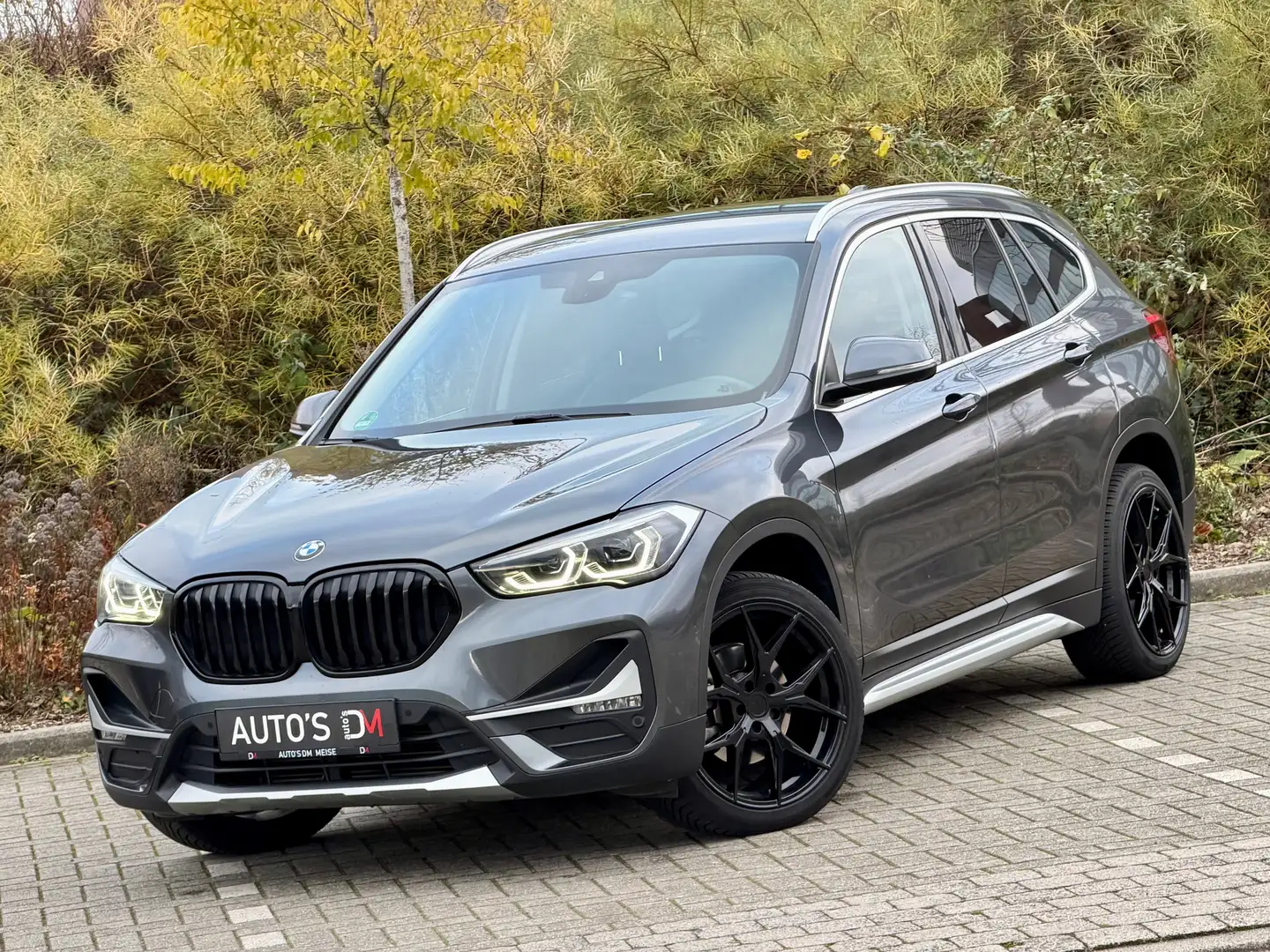 BMW X1 sDrive18d Aut. Half Leder,Camera,Airco,Cruise,PDC Grijs - 1