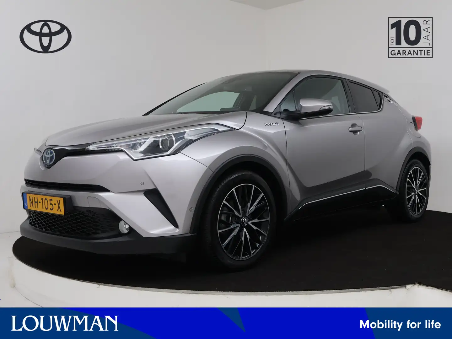 Toyota C-HR 1.8 Hybrid Executive | Navigatie | Trekhaak | PDC Grijs - 1